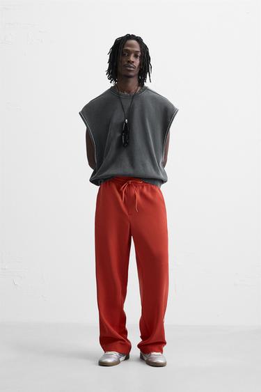 PANTALÓN RELAXED FIT BANDAS CONTRASTE - Rojo de Zara - Imagen 0
