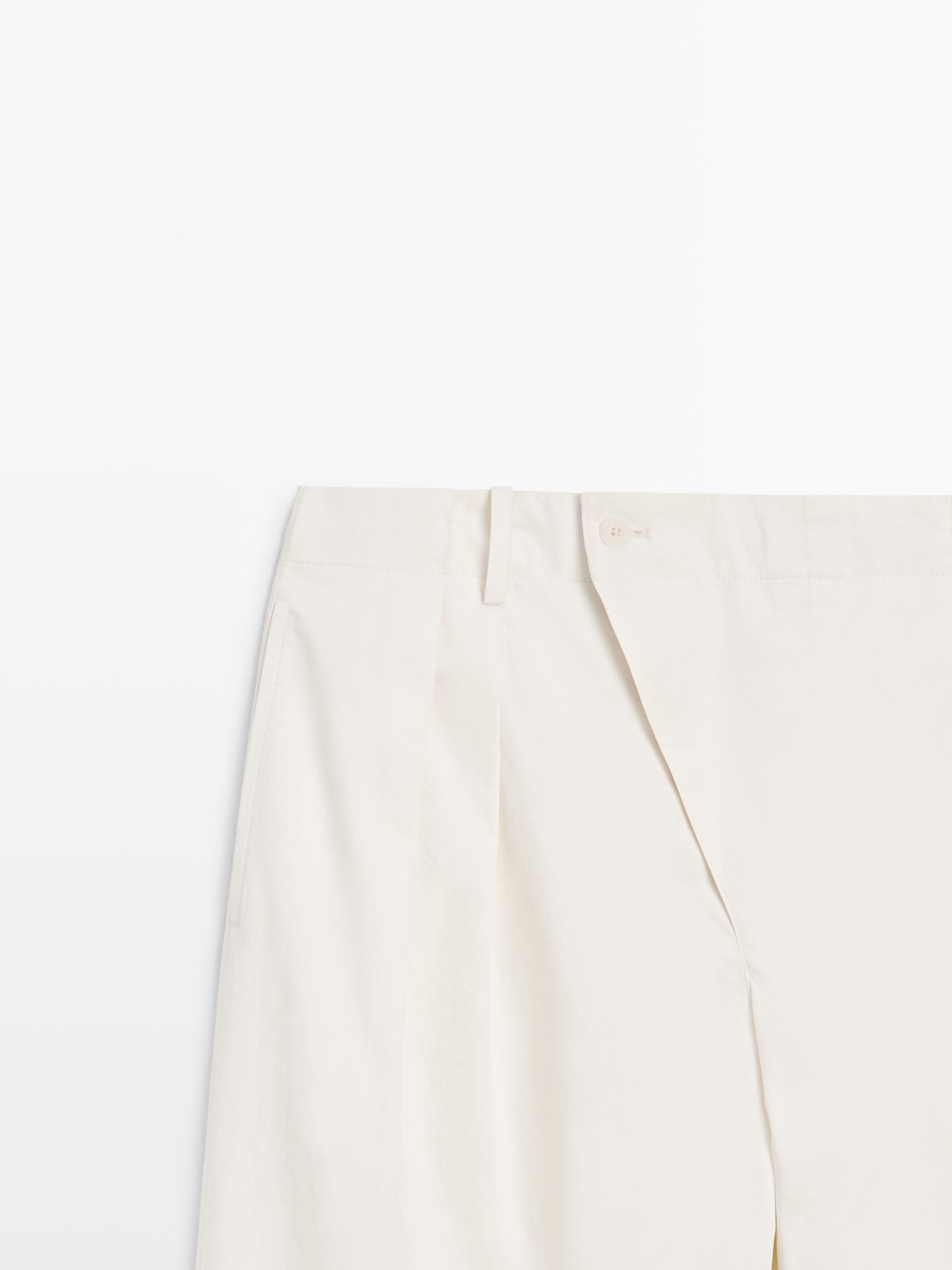 Pleated trousers with crossover fastening - STUDIO