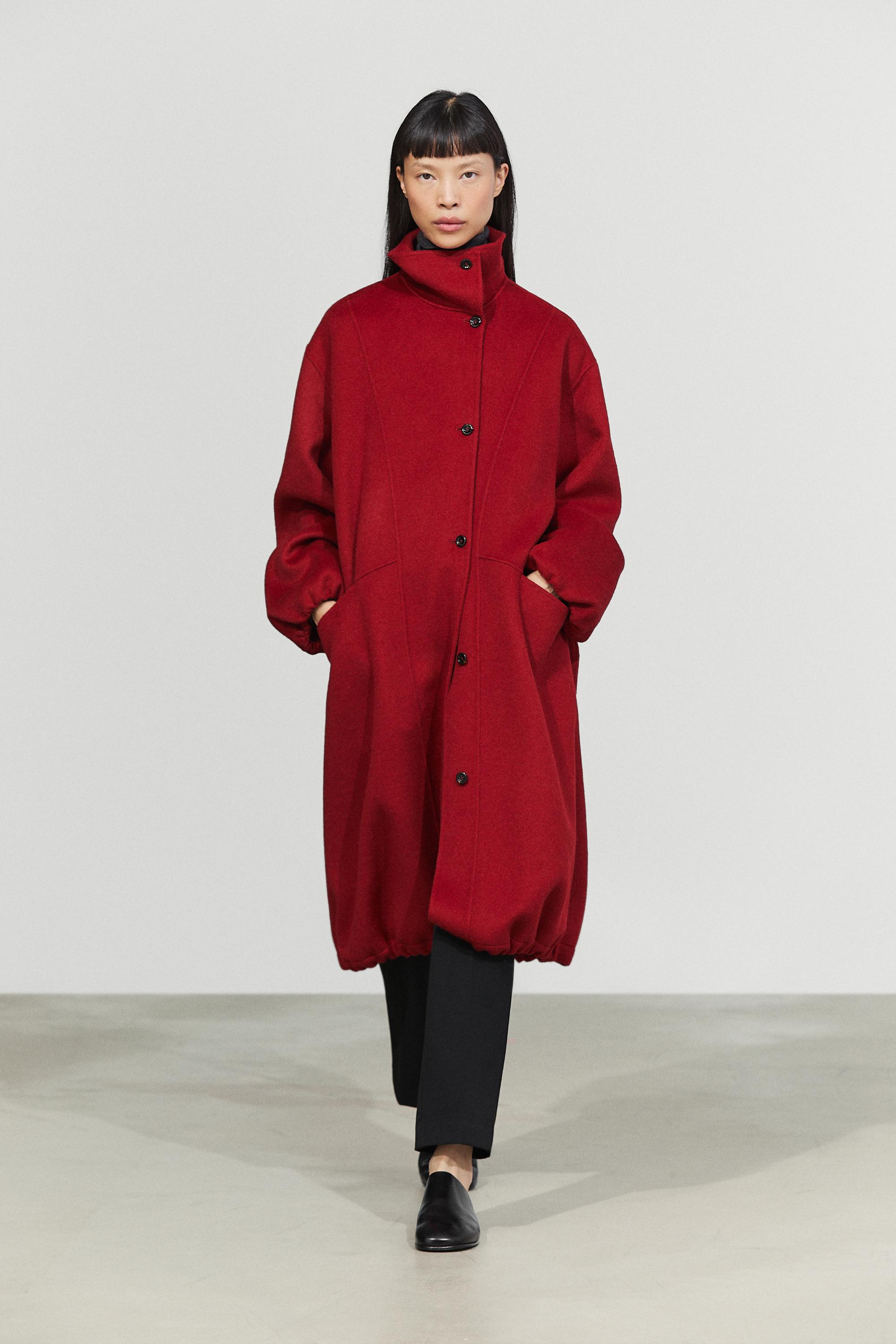 Long coat with asymmetrical collar detail