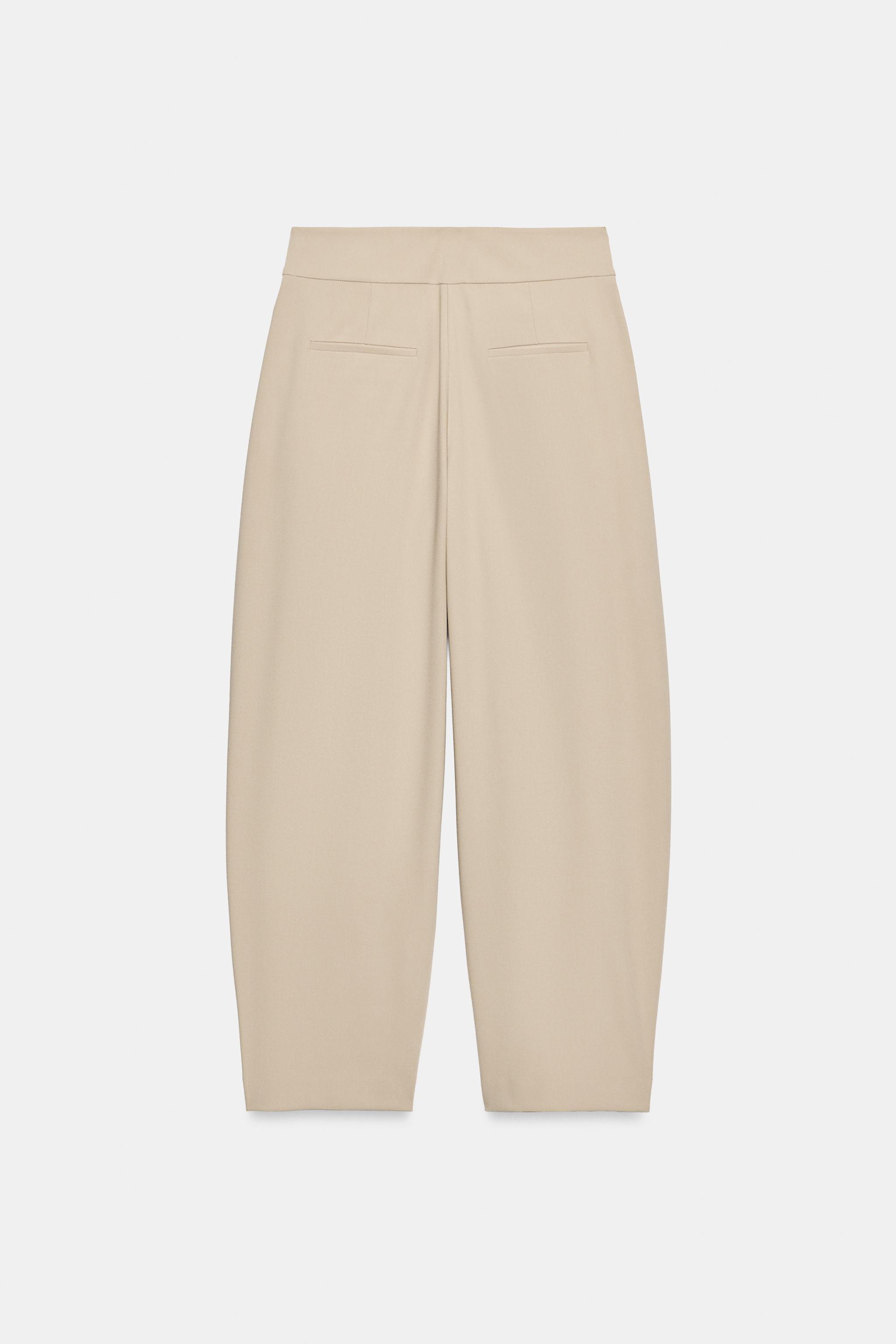 PLEATED CARROT TROUSERS