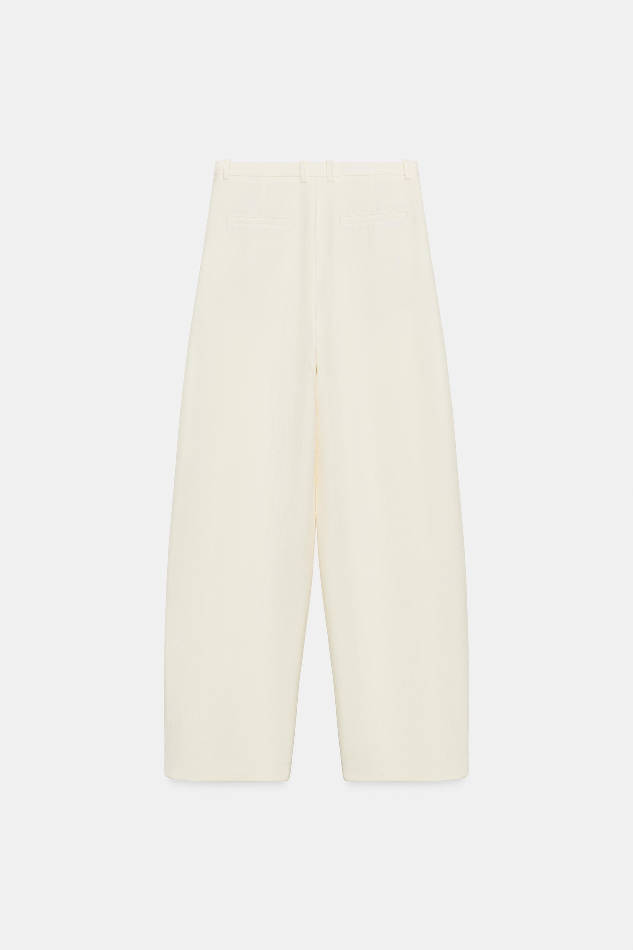 VOLUME PLEATED PANTS
