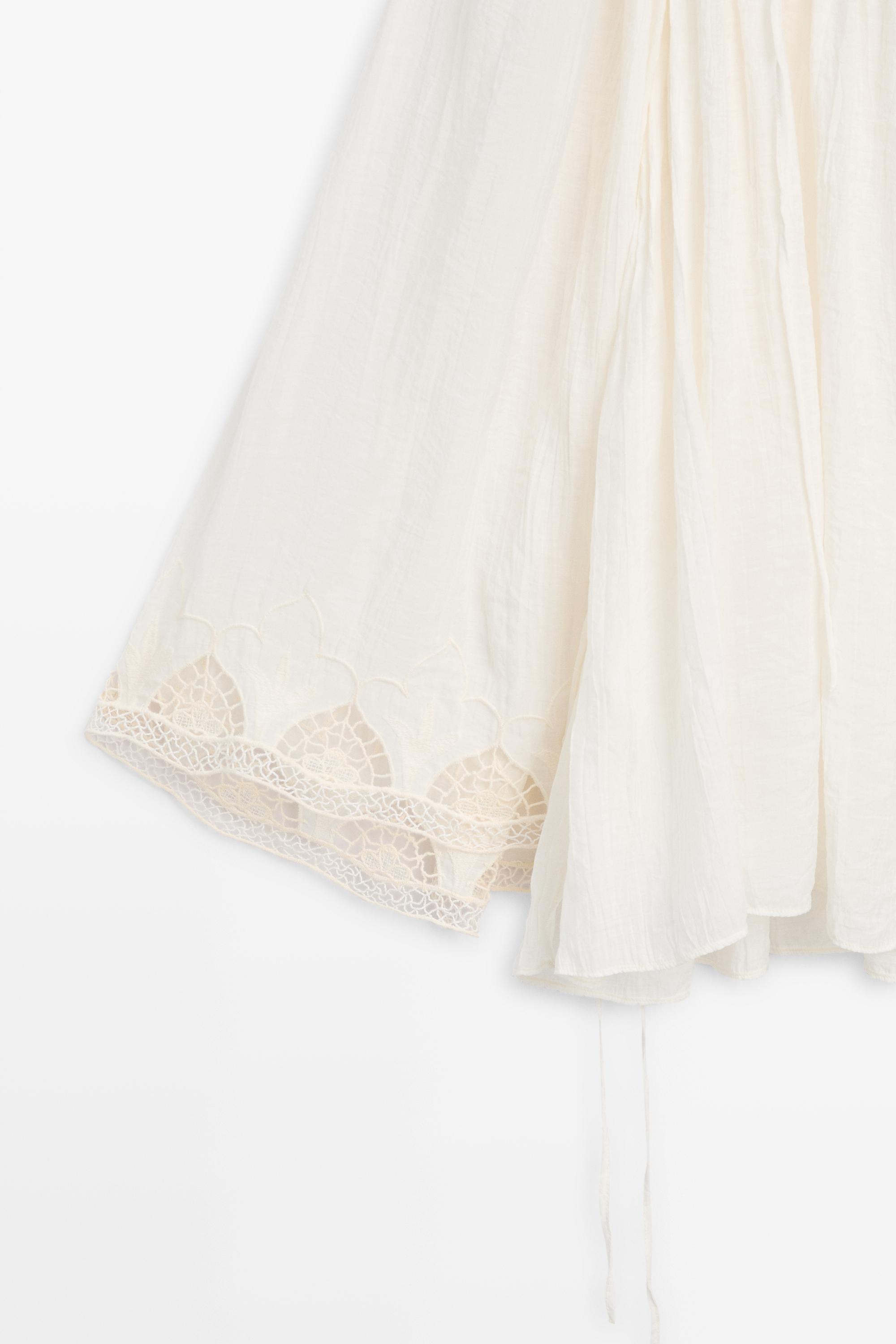 Embroidered flowing blouse