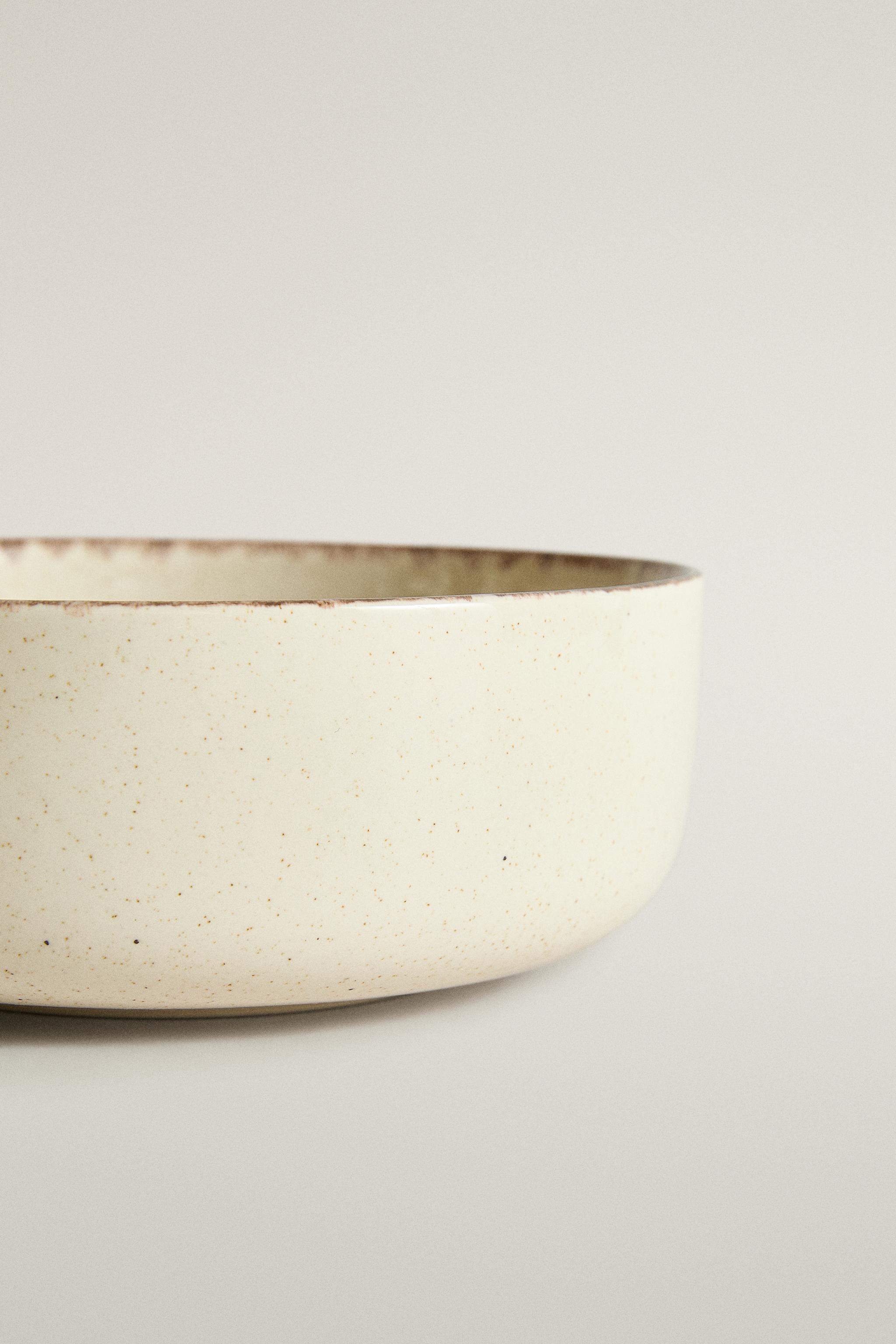 STONEWARE BOWL WITH AGED RIM