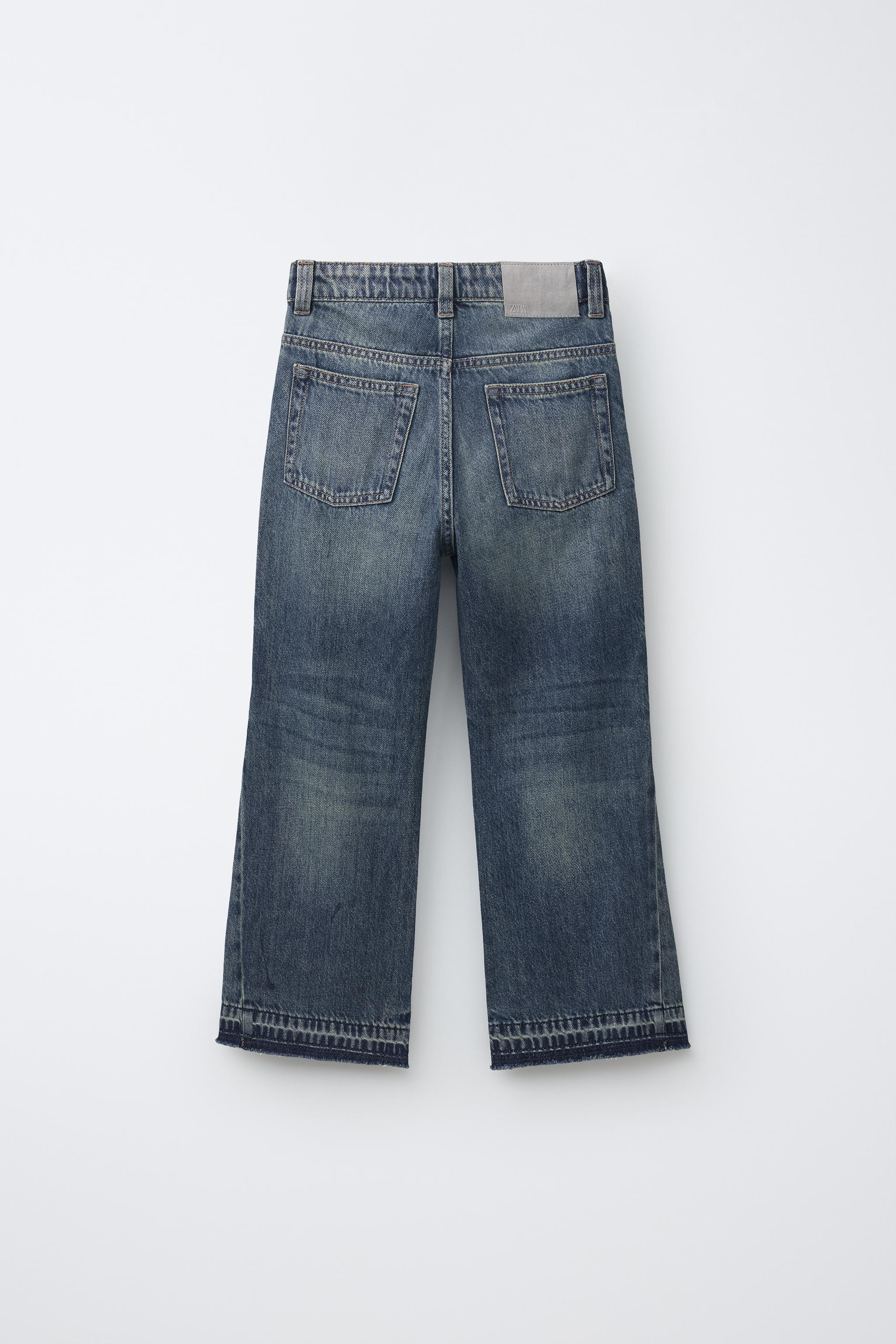 FLARE FIT FRAYED JEANS
