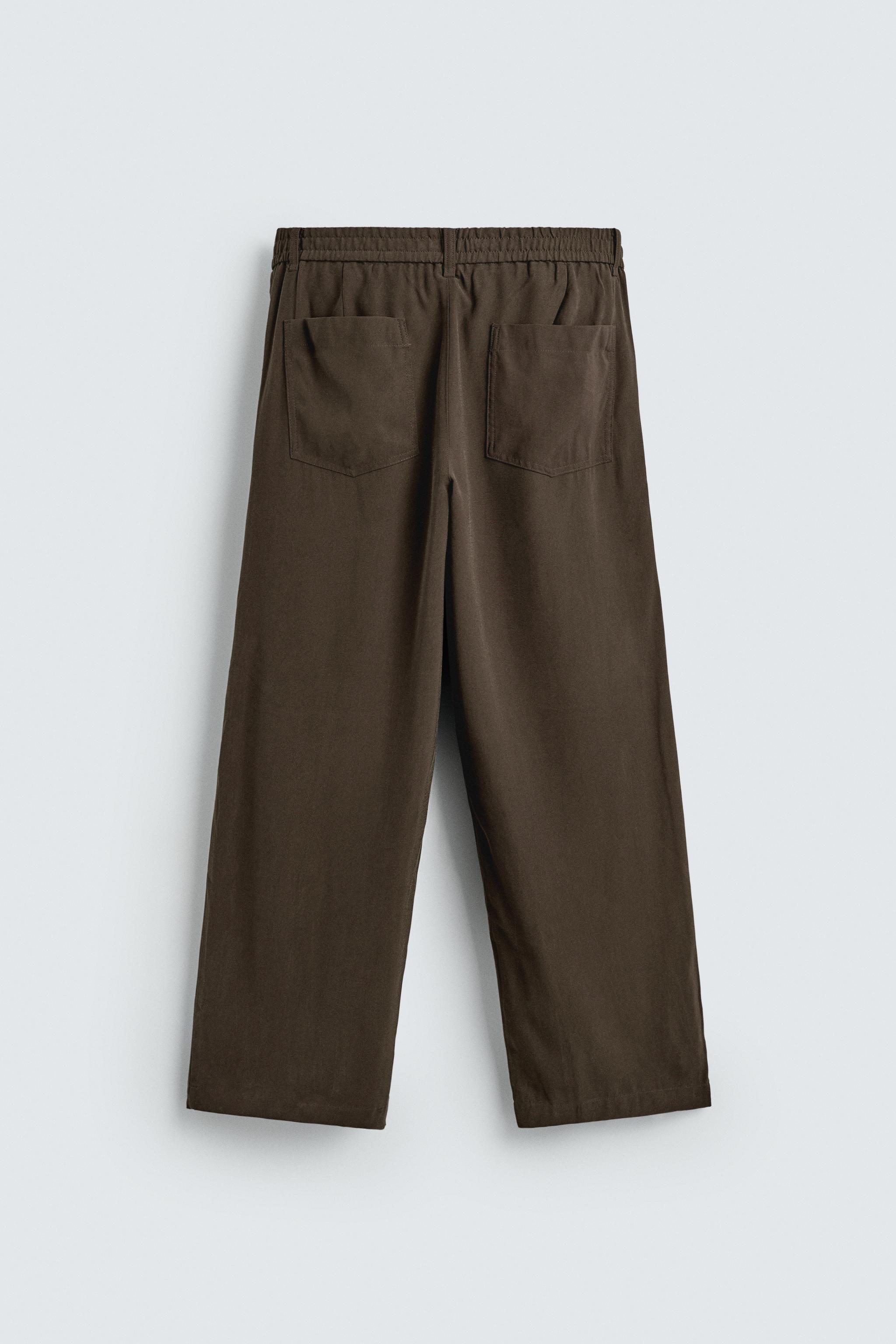 RELAXED FIT FLOWY PANTS