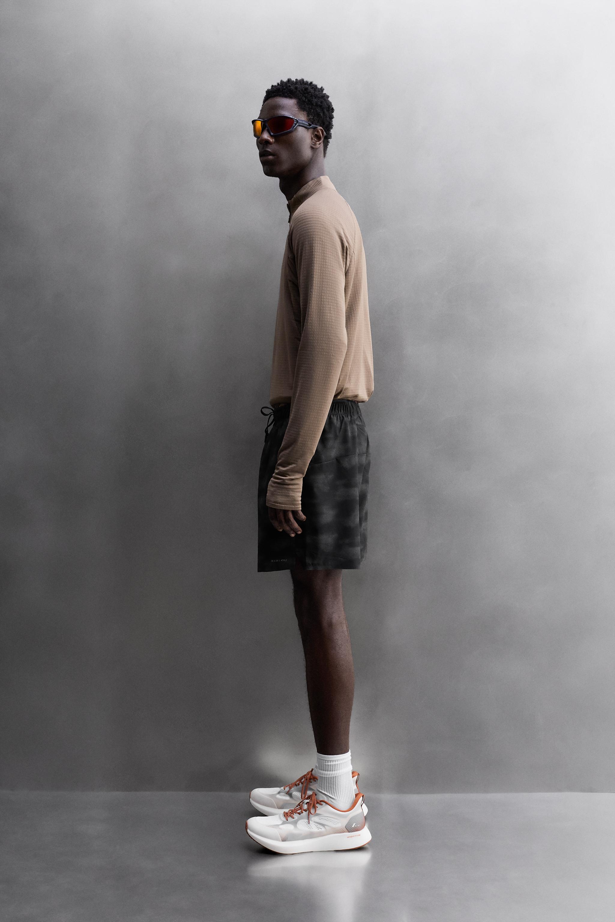 PERFORATED RUNNING SHORTS