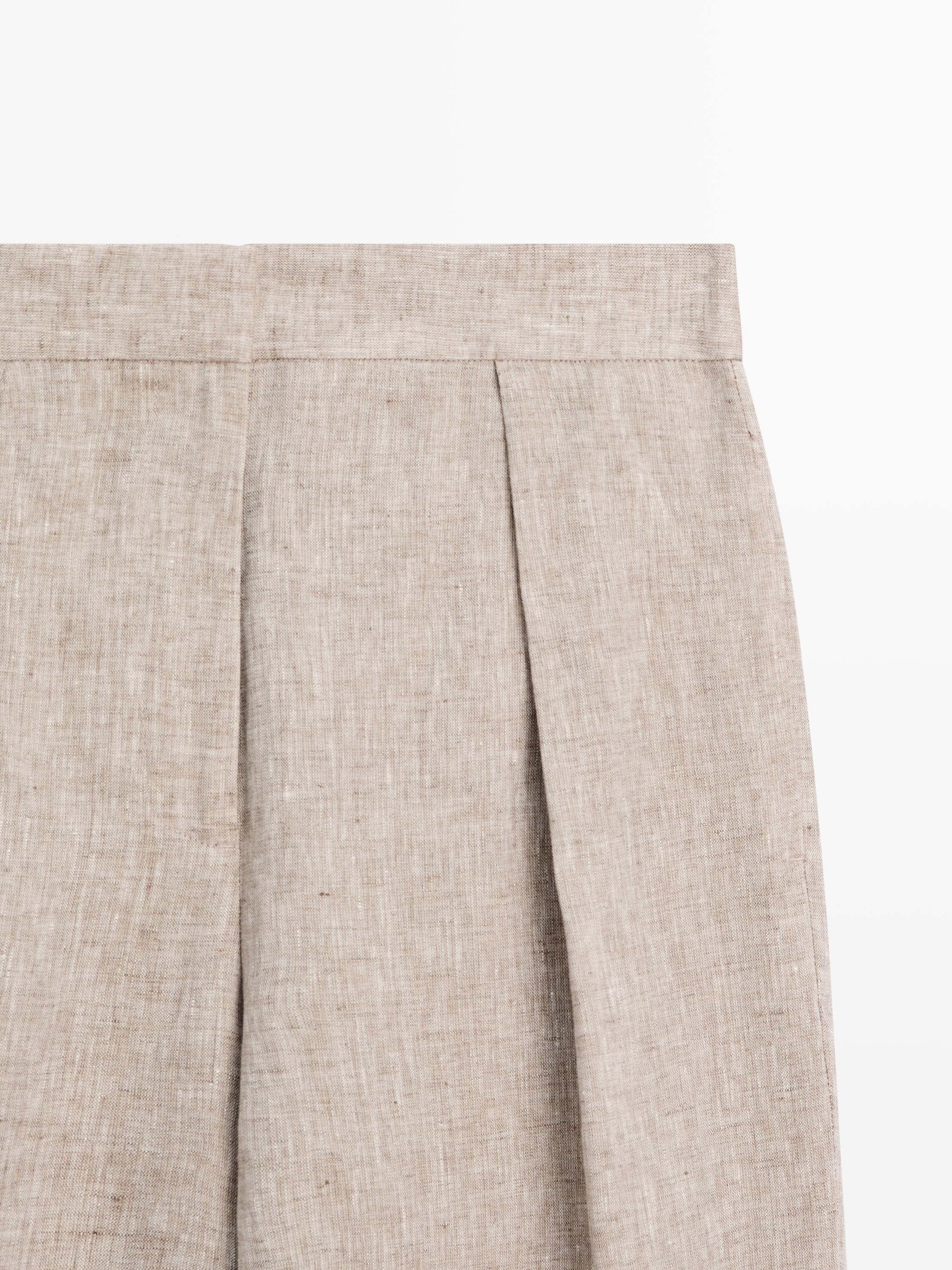 Suit trousers with buckle detail