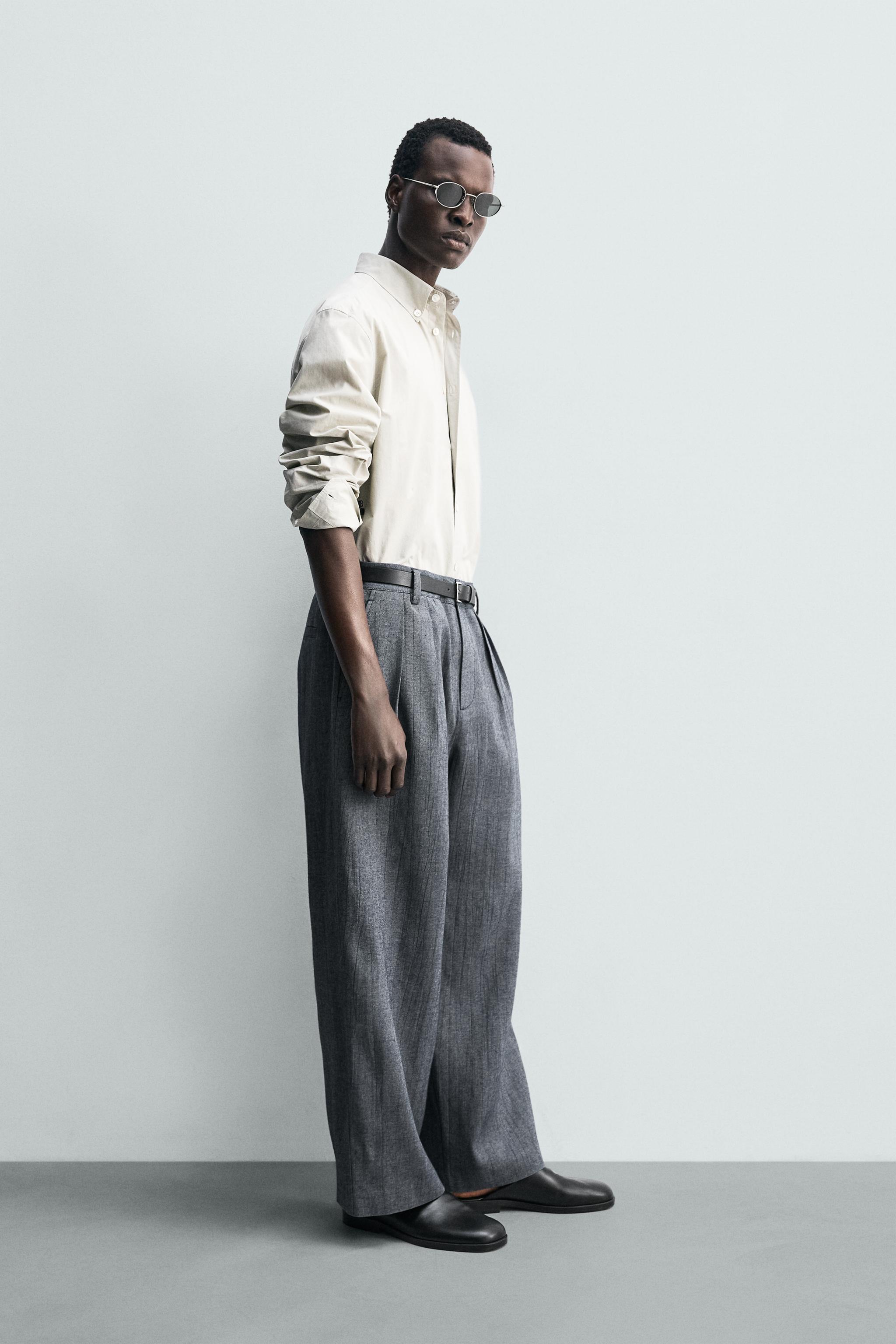 PLEATED RELAXED FIT PANTS