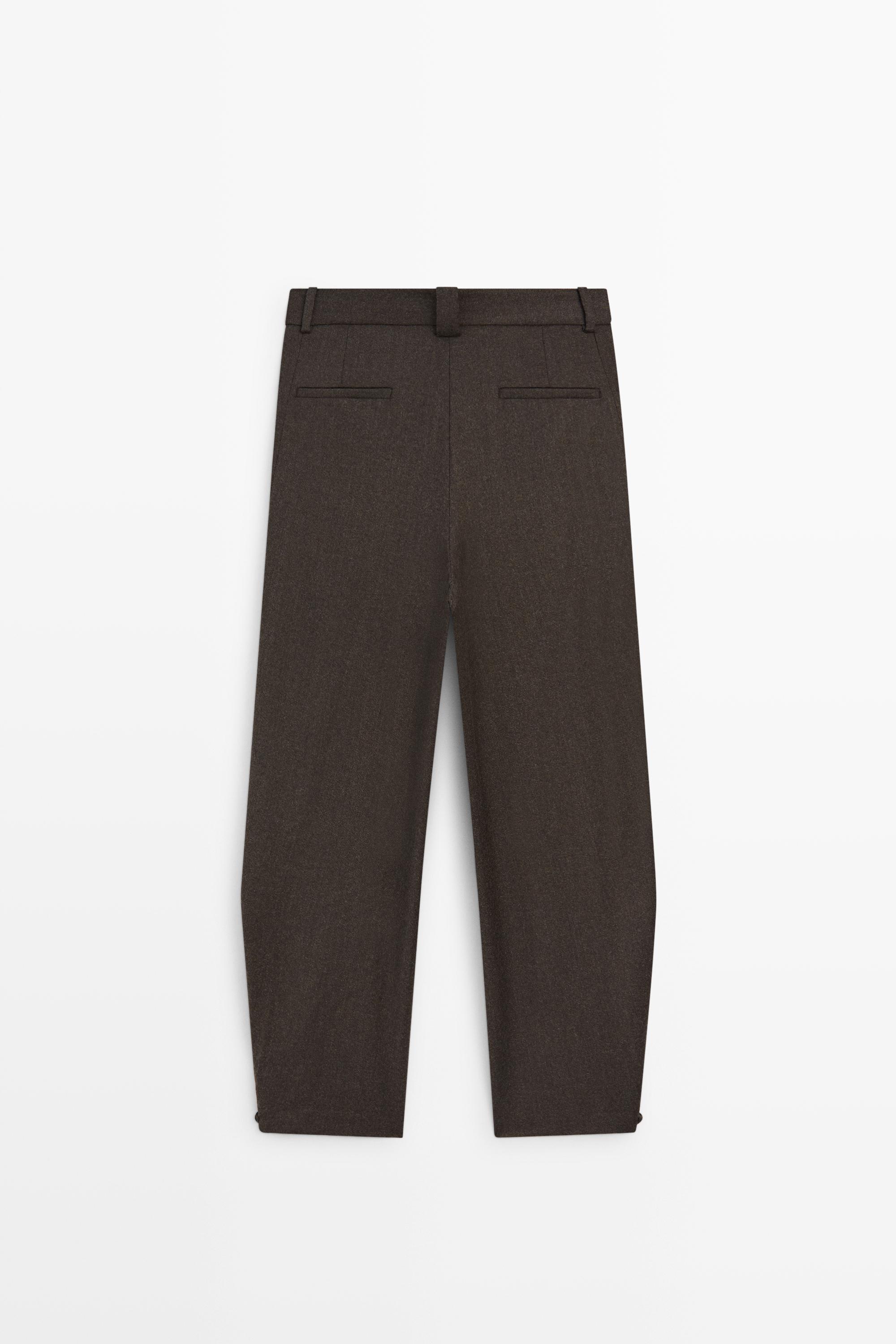Pleated flannel trousers with hem detail
