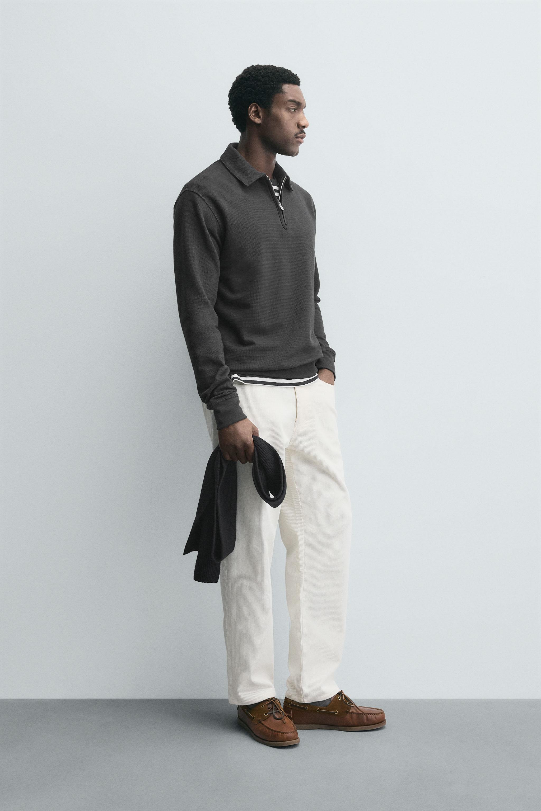 POLO STRUCTURÉ À ZIP