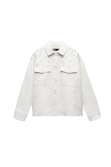 White jacket with buttons and front pockets. Pearl detailing on the shoulders. Visible label with the text "ZARA".