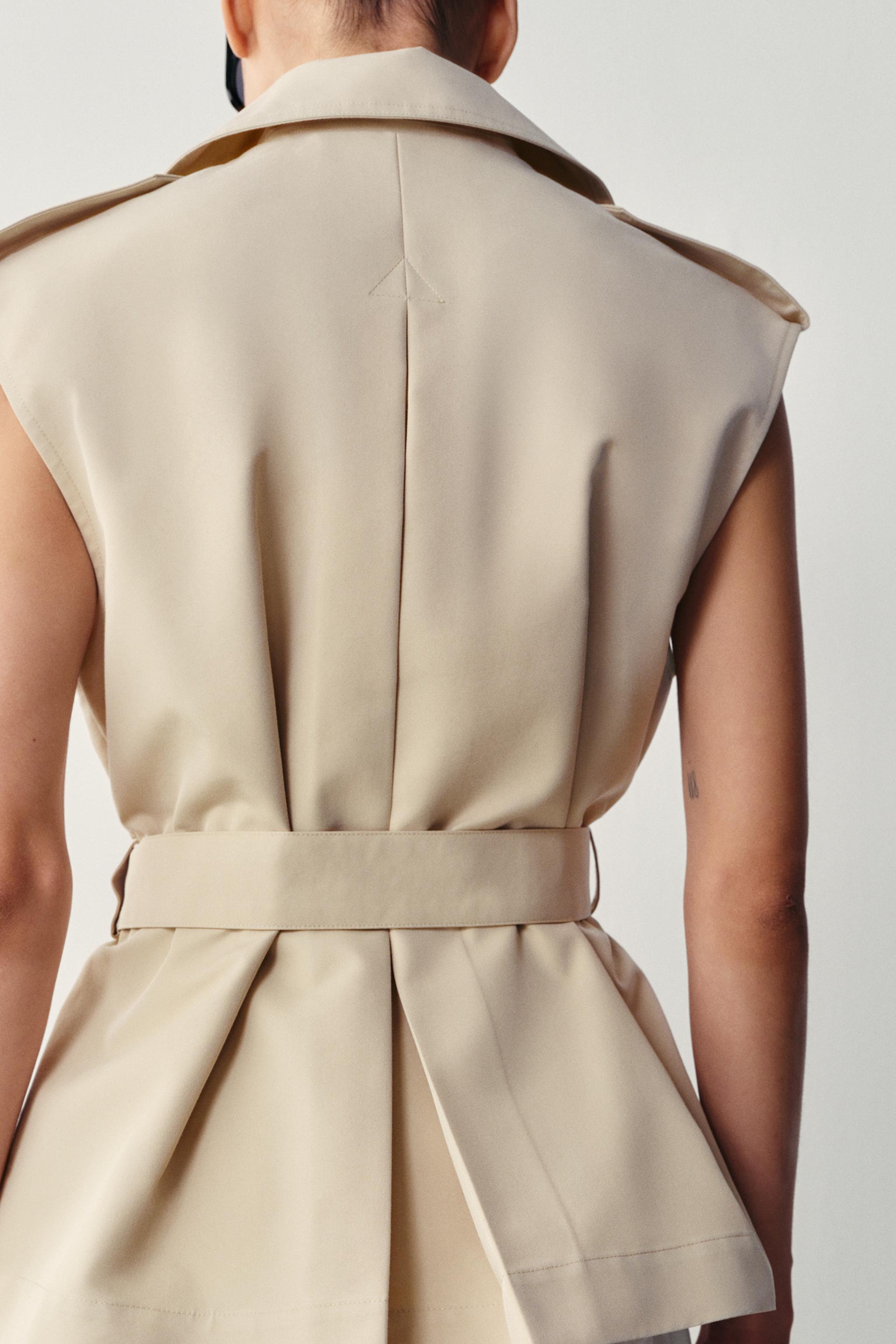 DOUBLE-BREASTED BELTED VEST