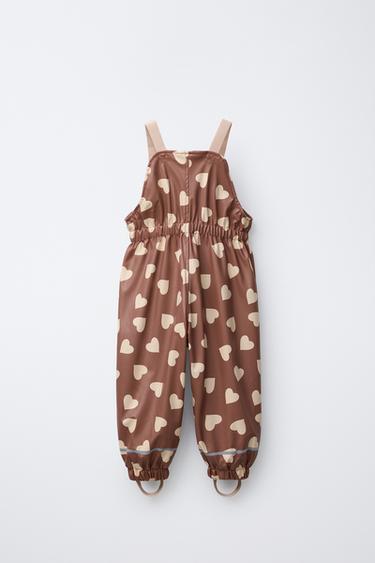 WATER RESISTANT PRINTED RUBBERISED DUNGAREES - Pink by Zara - Image 1