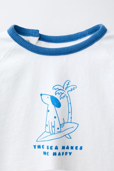 T-SHIRT IMPRIMÉ CHIEN SURFEUR - Écru clair de Zara - Image 2