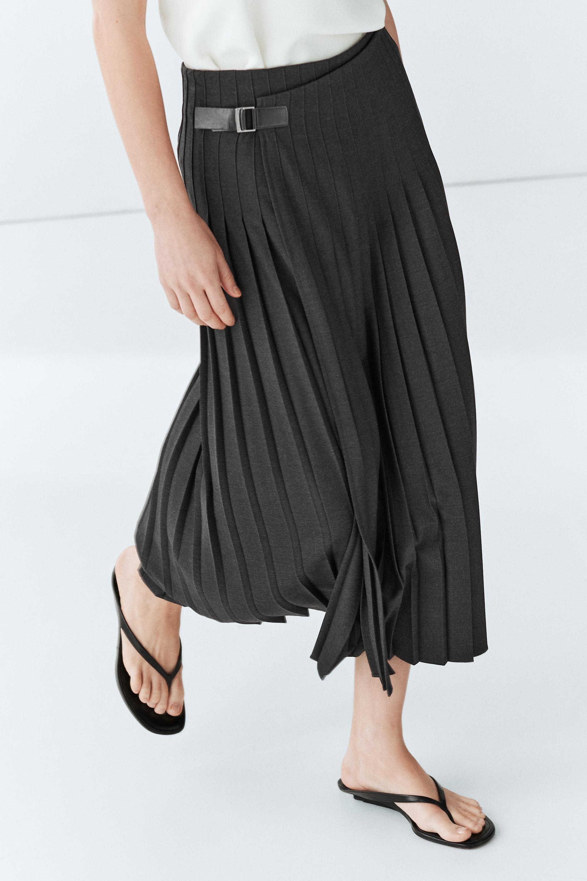 Jupe midi plissée applique