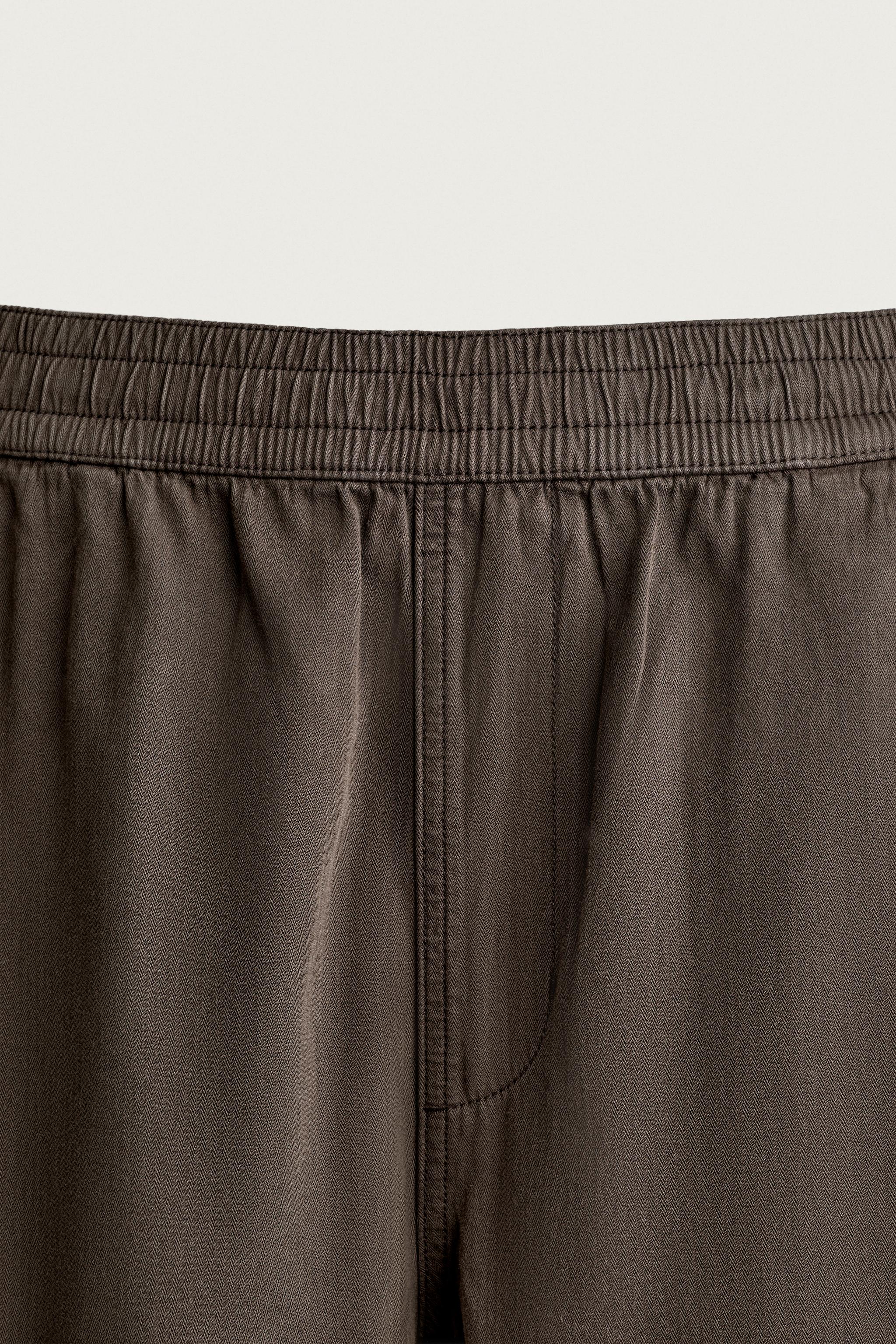 RELAXED FIT HERRINGBONE PANTS