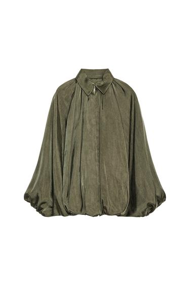 Front view of an olive green blouse featuring a classic collar, wide sleeves and decorative pleats on the body.