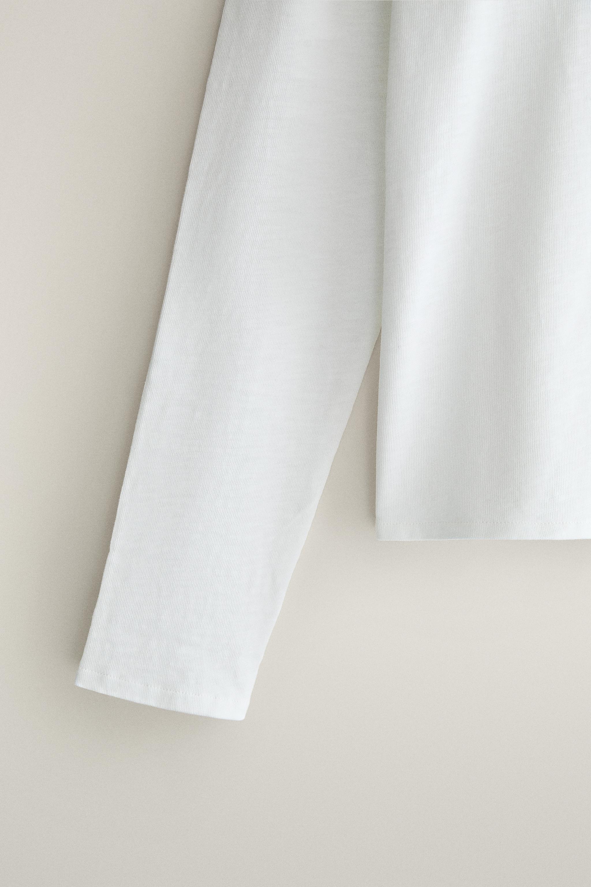 TOP MANCHES LONGUES BOUTONNÉ