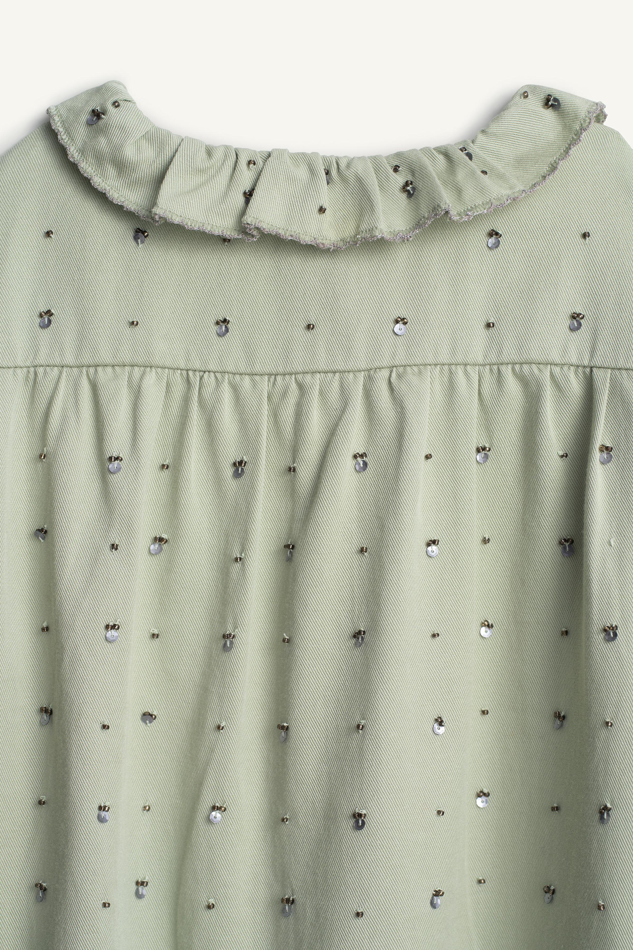 BLOUSE COL VOLANT SEQUINS ÉDITION LIMITÉE