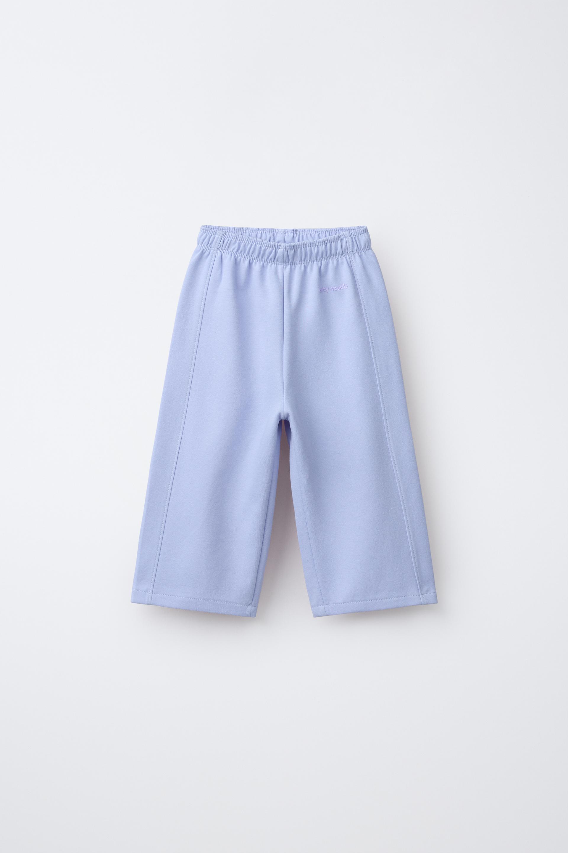 Wide-Leg Interlock Trousers With Raised Slogan