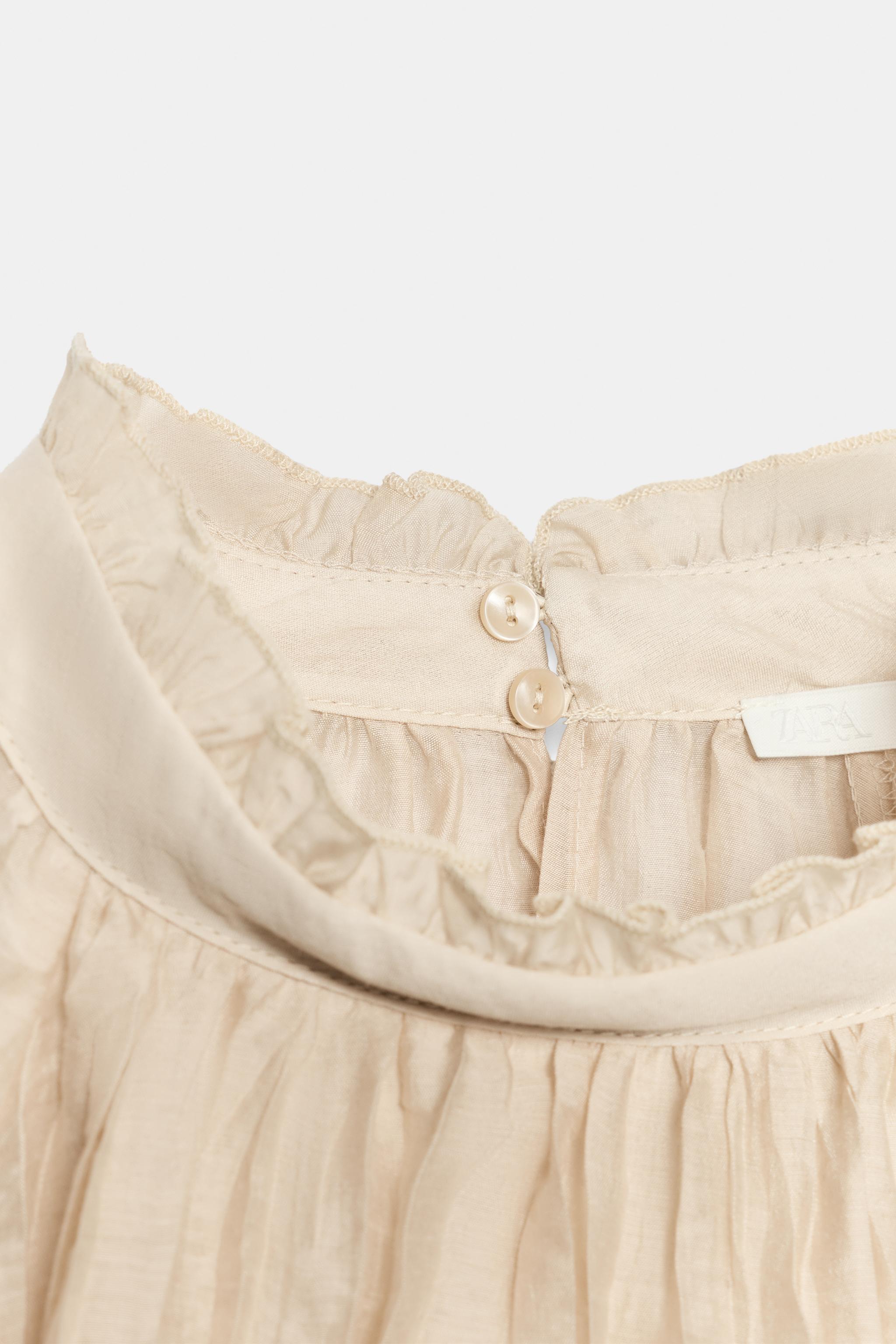 BLOUSE À VOLANTS