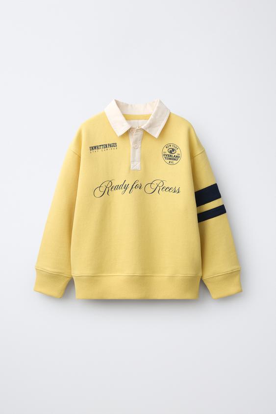 POLO ESTAMPADO TEXTO Y NÚMERO - Amarillo de Zara - Imagen 0