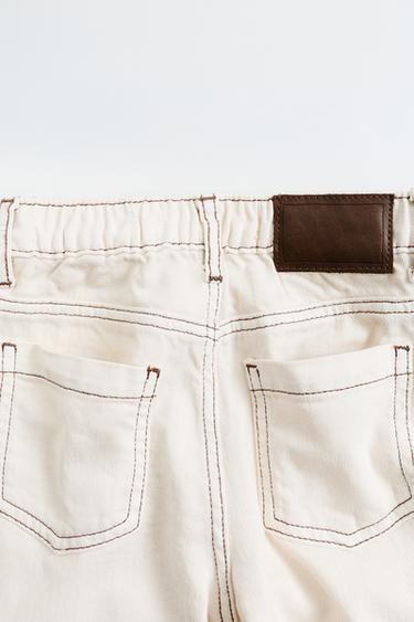 ZARA TIMELESS - PANTALÓN SARGA STRAIGHT PESPUNTES CONTRASTE - Crudo de Zara