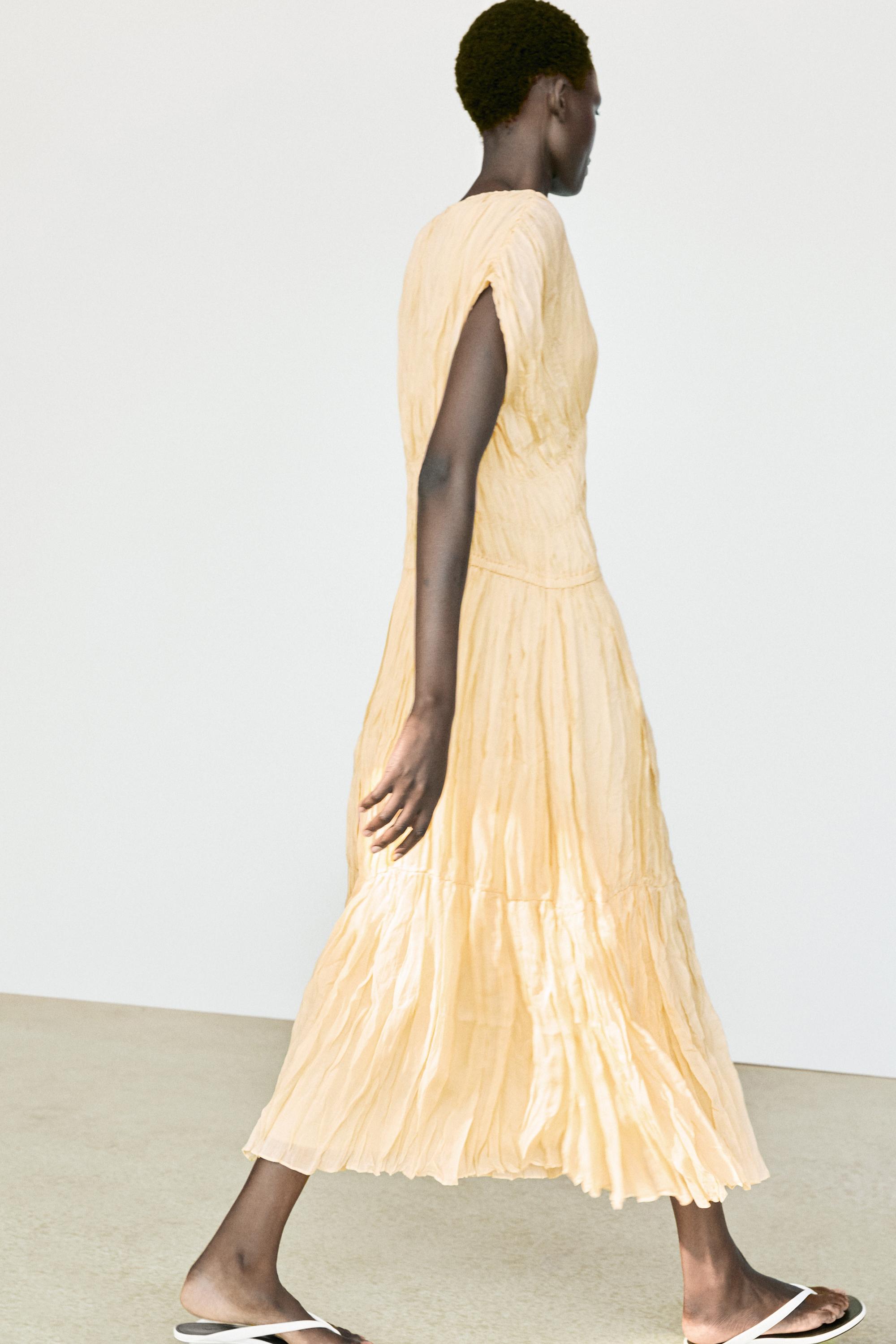 Robe midi fluide froncée