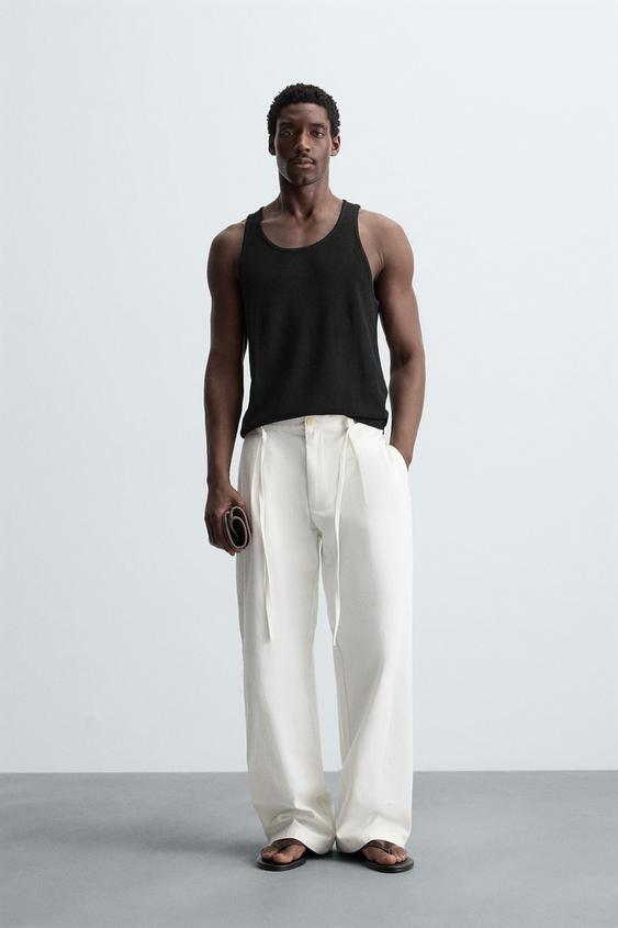 RELAXED FIT PLEATED PANTS