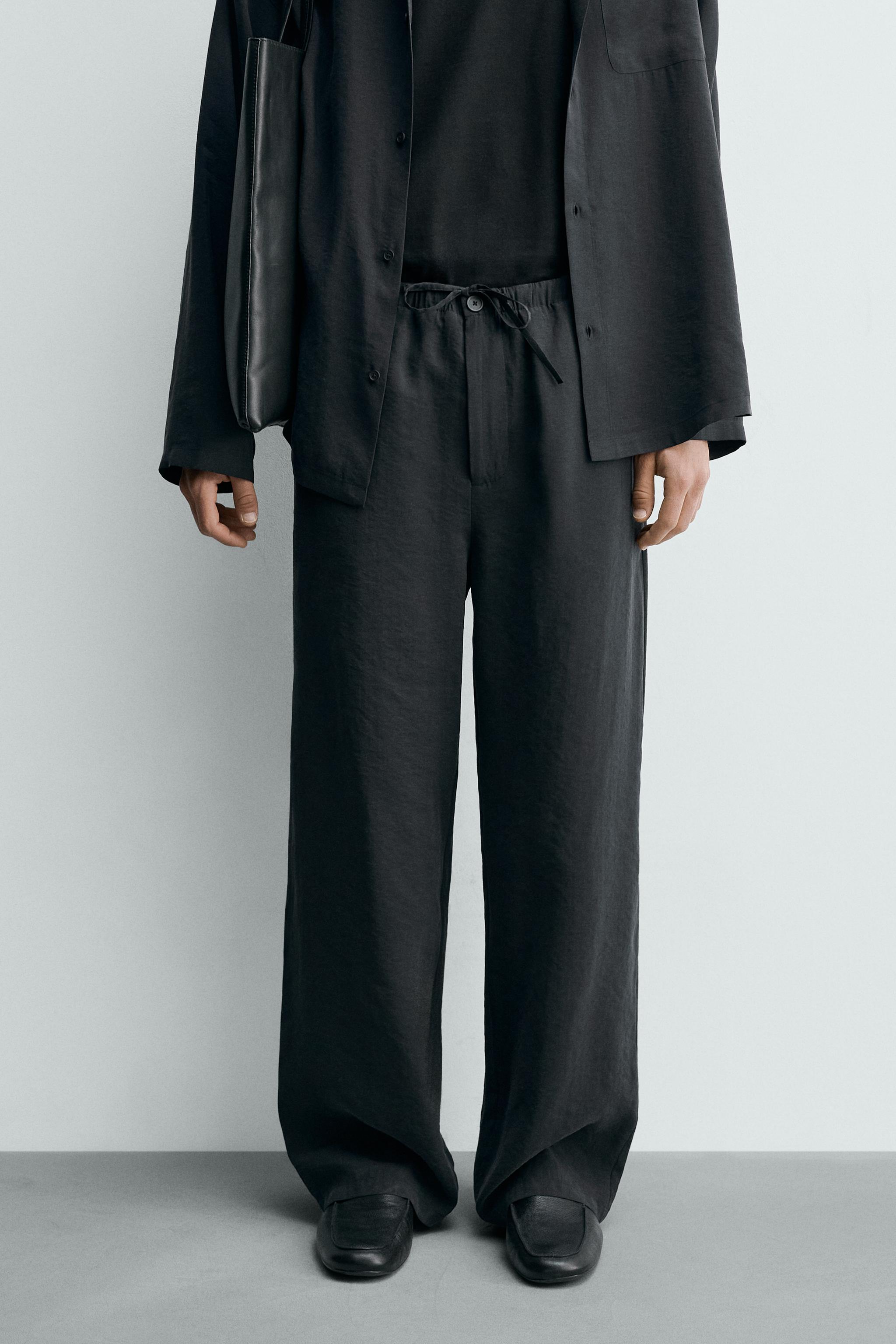FLOWY RELAXED FIT PANTS — Black