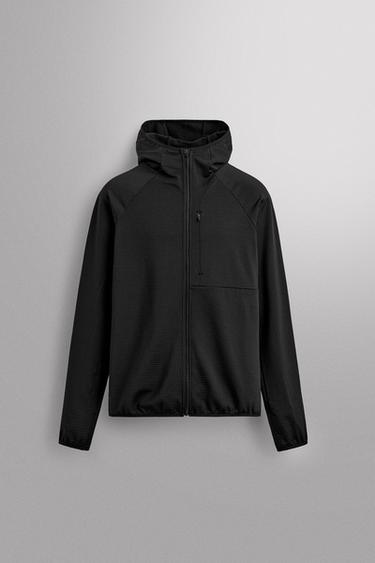 CAÇADORA TÈCNICA AMB CAPUTXA COMBINADA - Negre de Zara