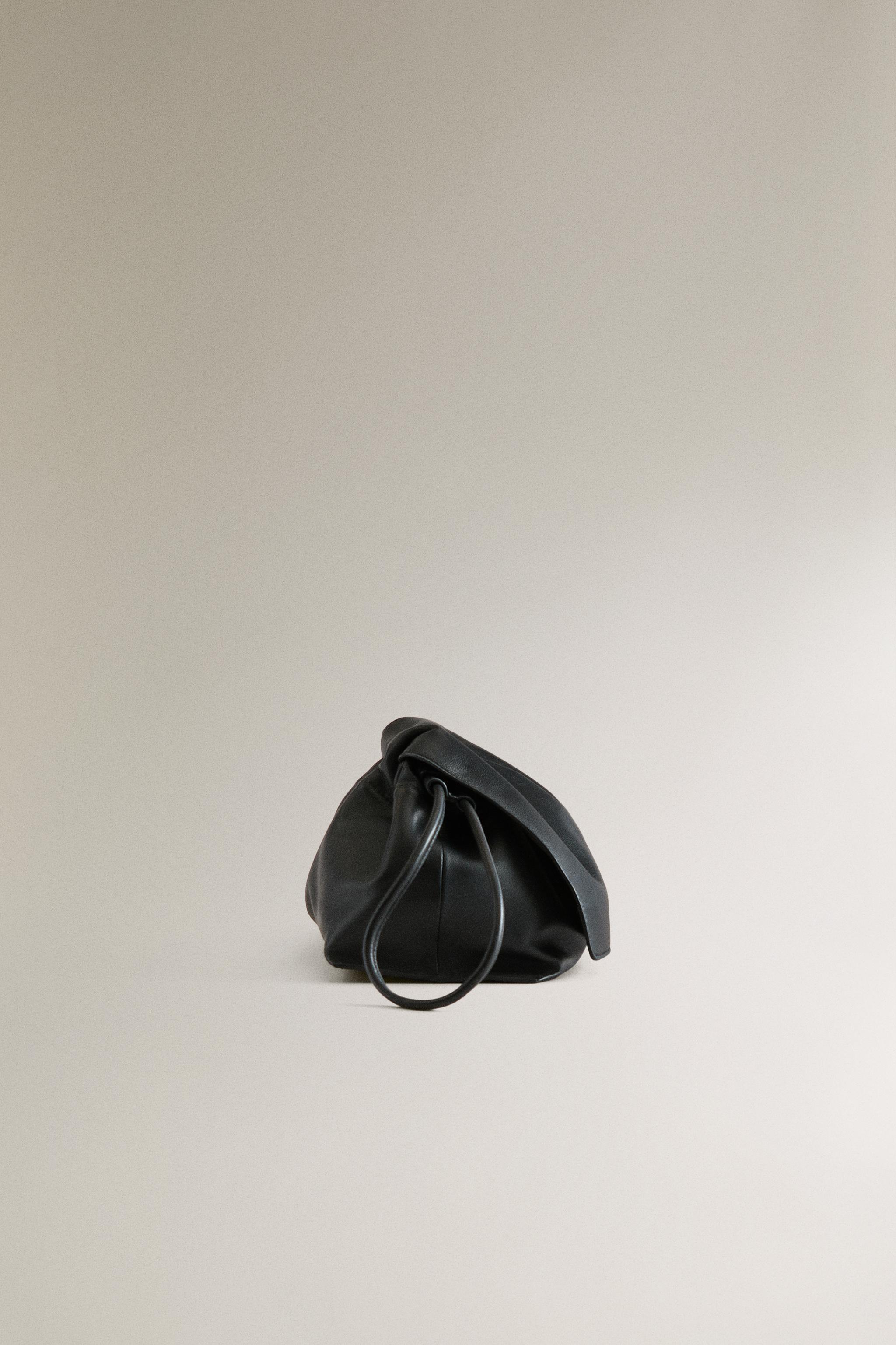 LEATHER POUCH MAKEUP BAG