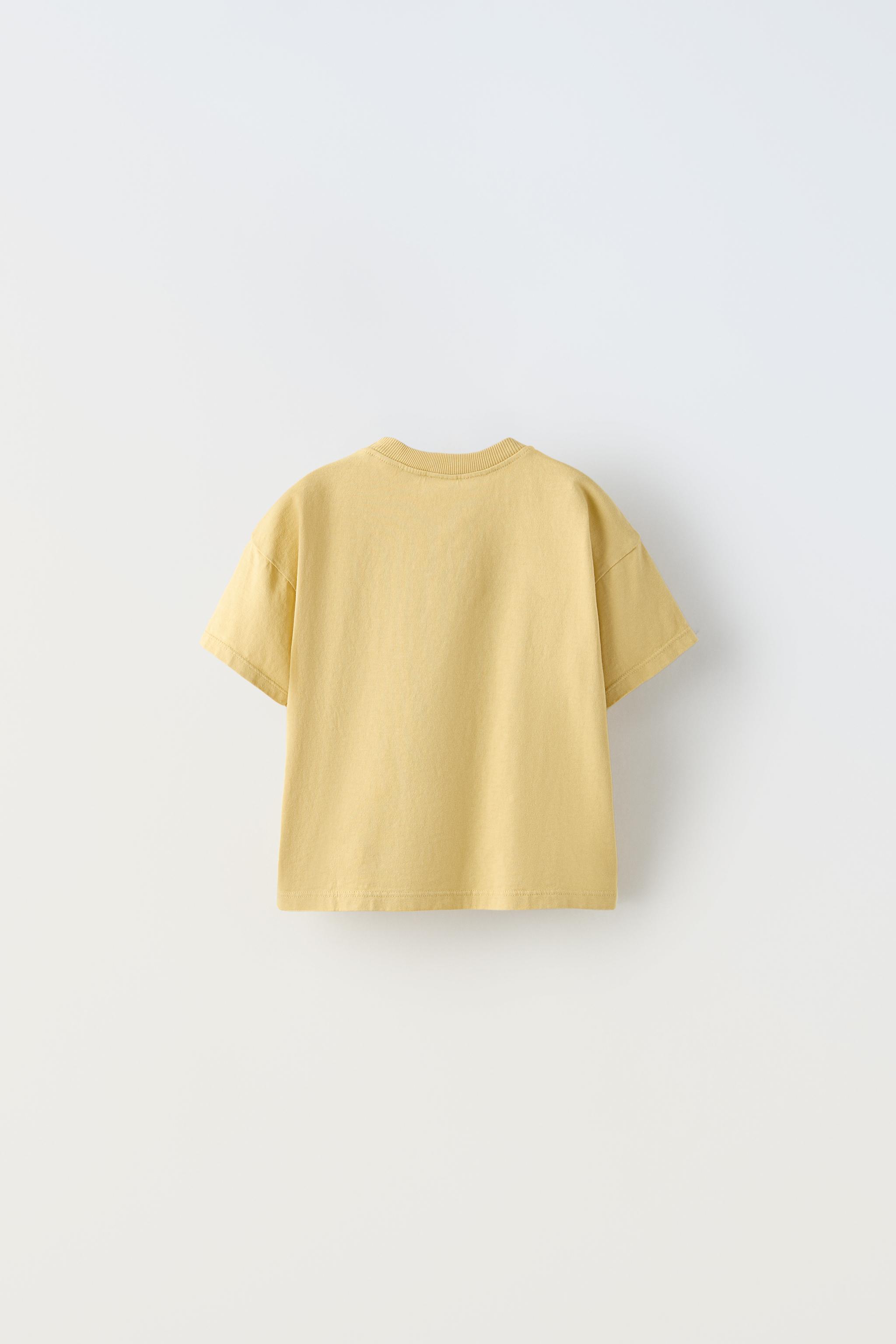 Zara store yellow shirt