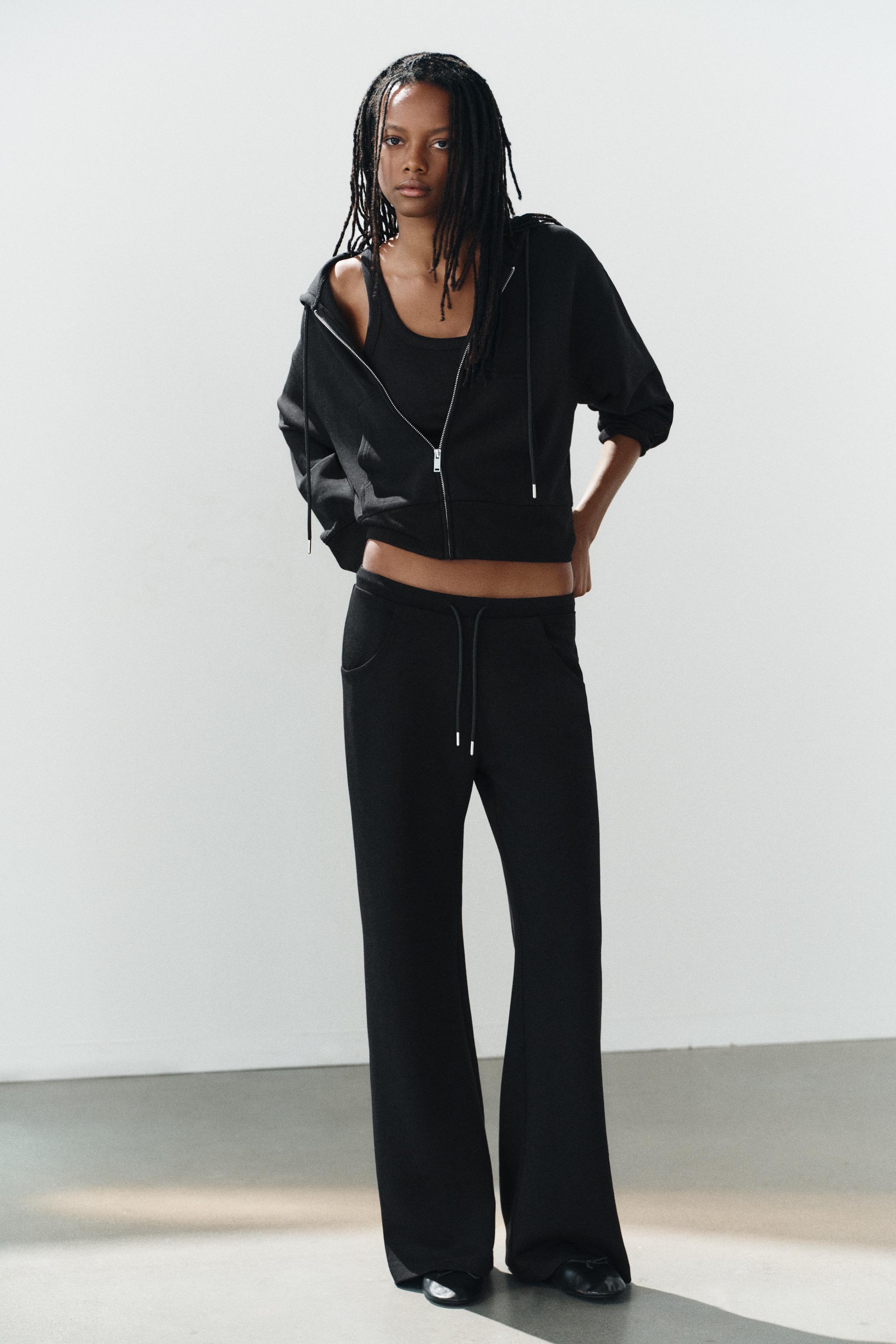 INTERLOCK FLARE PANTS — Black