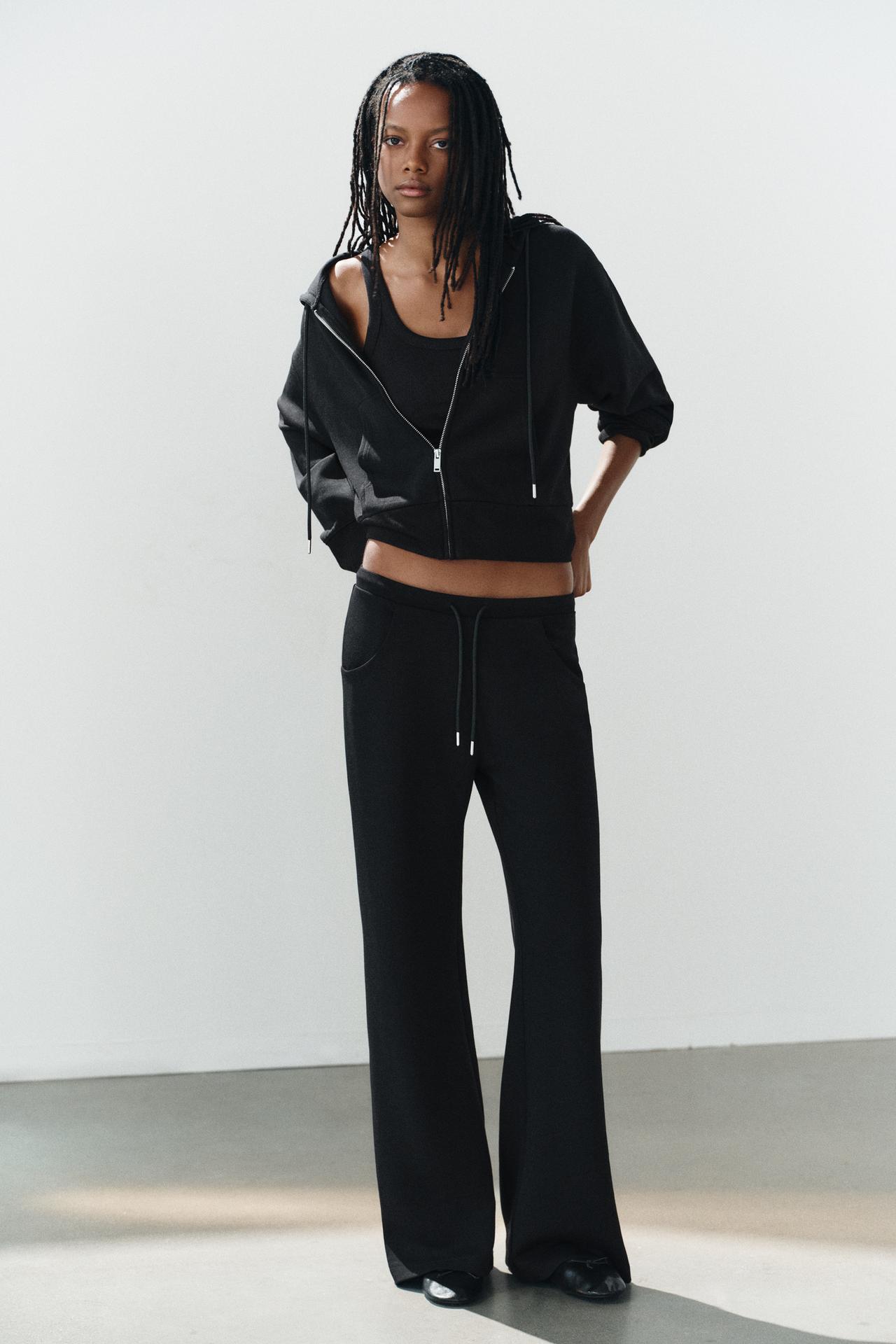 INTERLOCK FLARED PANTS — Black
