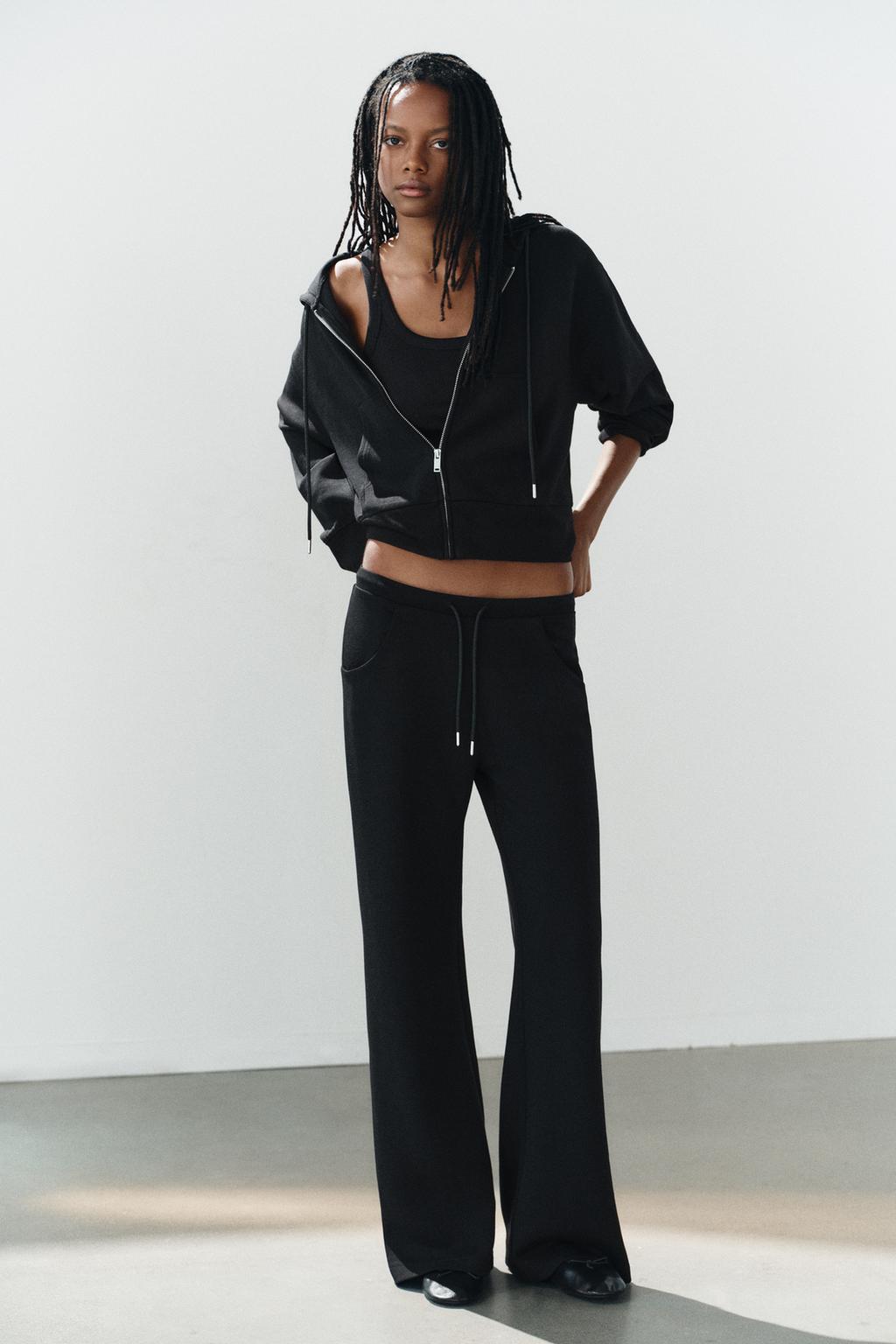 INTERLOCK FLARED TROUSERS