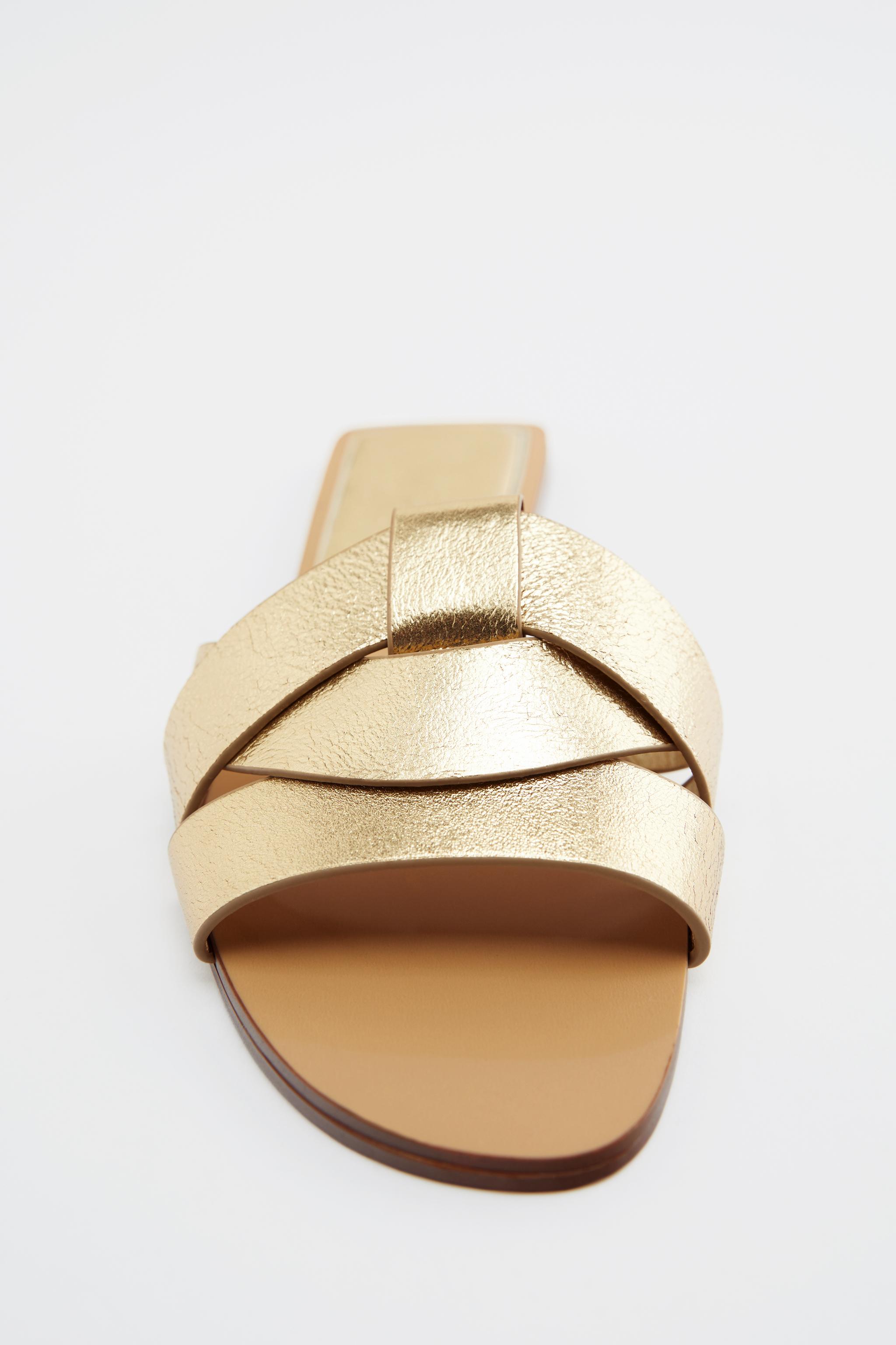 FLAT CROSSED LEATHER SANDALS - Gold | ZARA United States