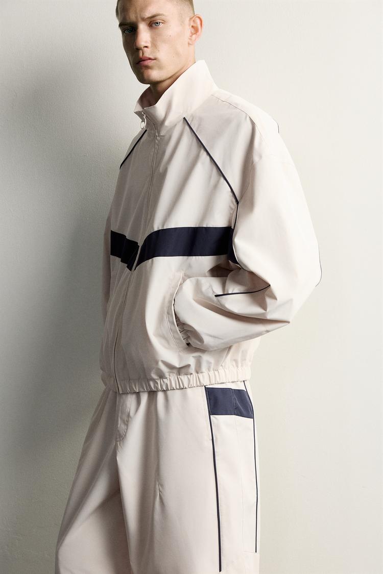 Chaqueta técnica repelente al agua con contraste 6