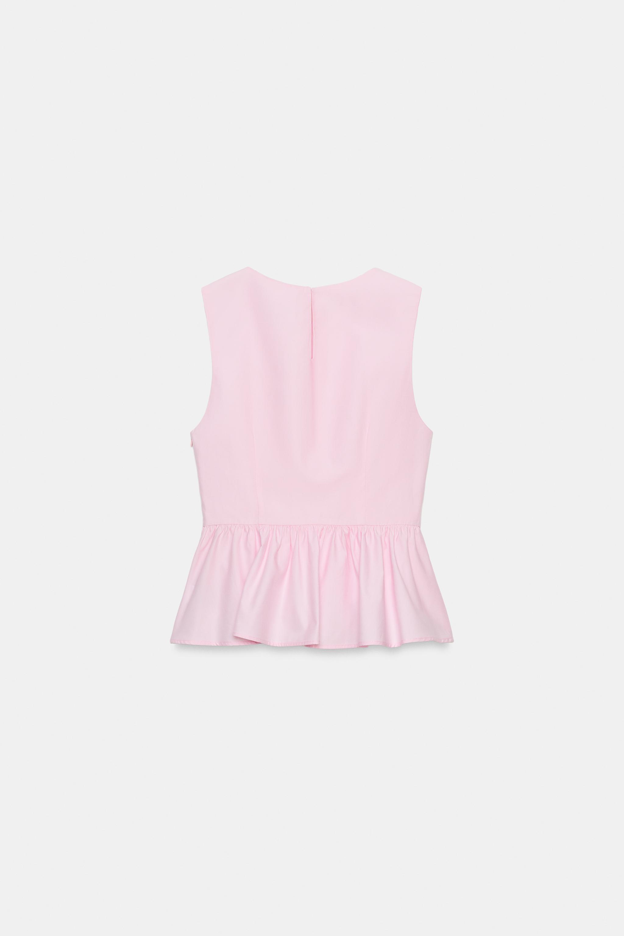 PEPLUM TOP WITH FIREMAN CLASPS