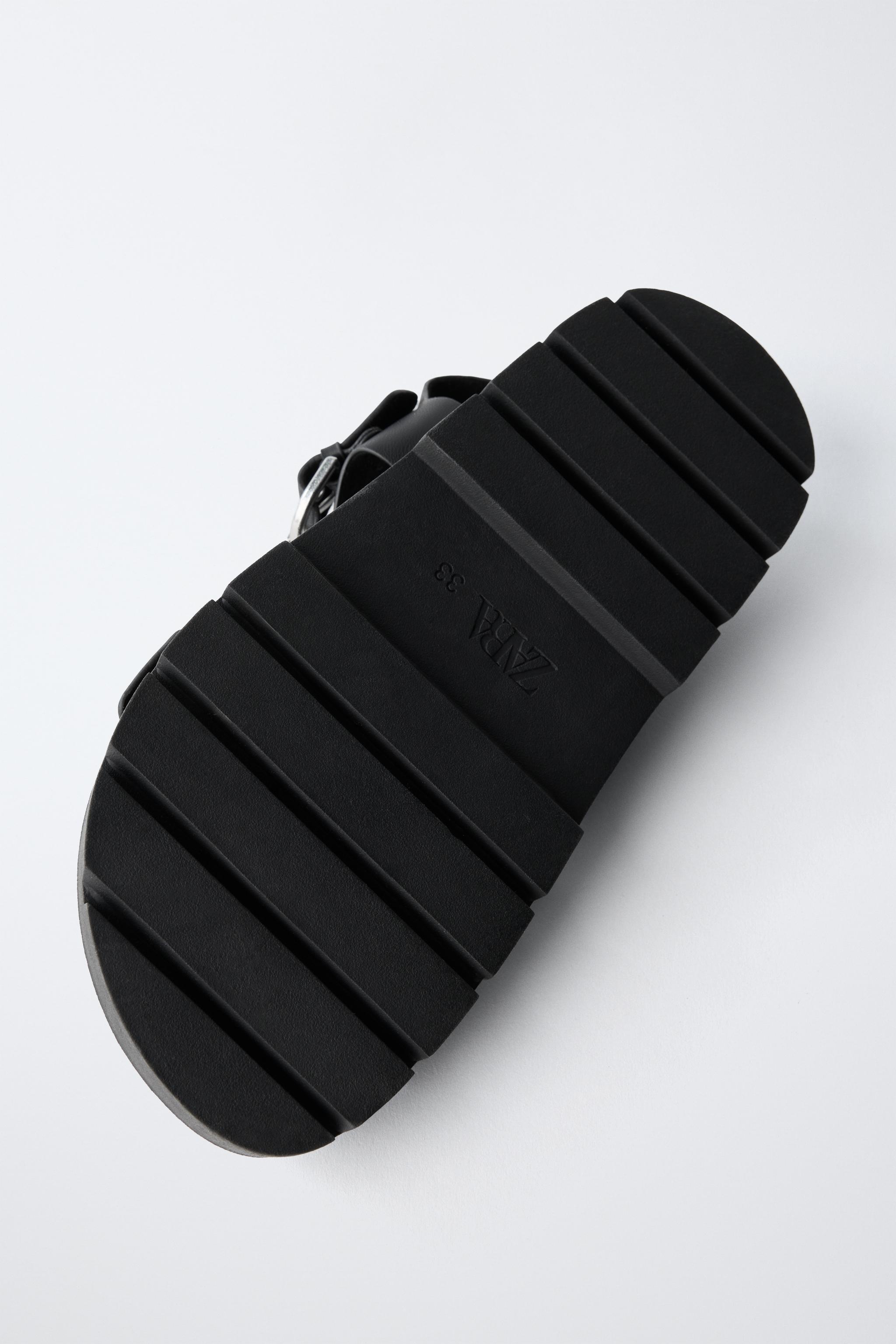 BUCKLED SANDALS
