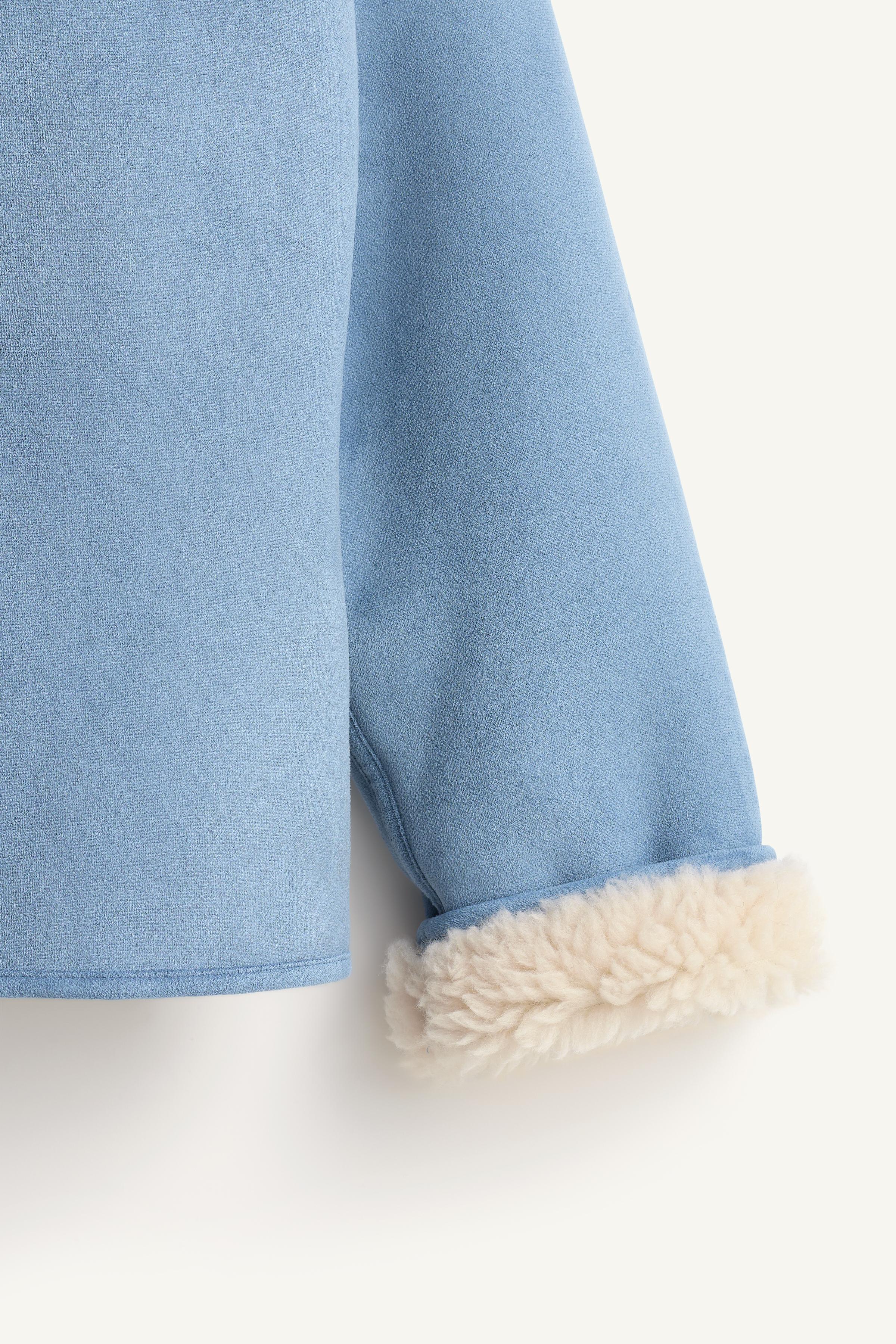 LIMITED EDITION REVERSIBLE DOUBLE-FACED SHEARLING JACKET