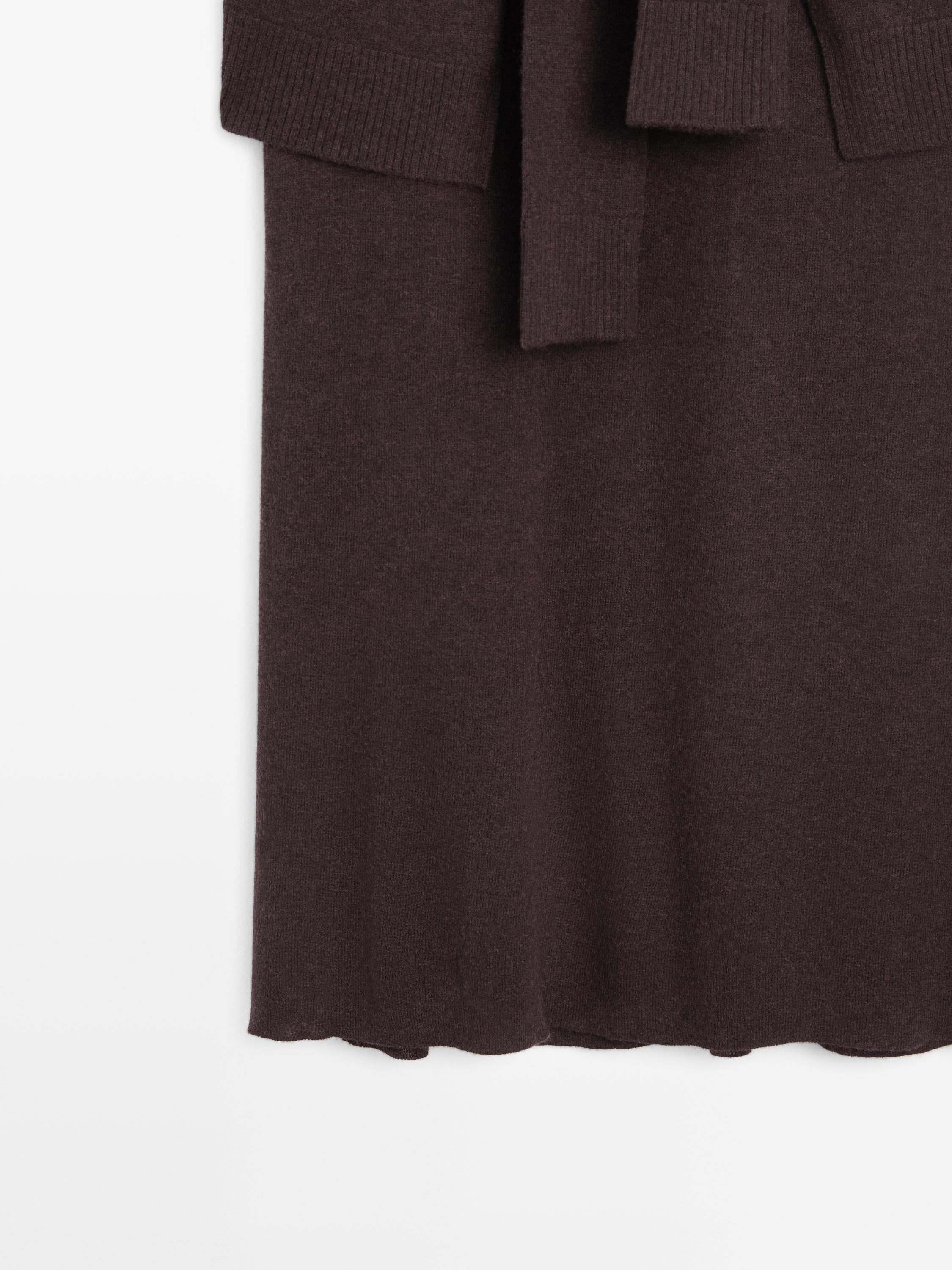 Knit skirt with knotted sleeve details