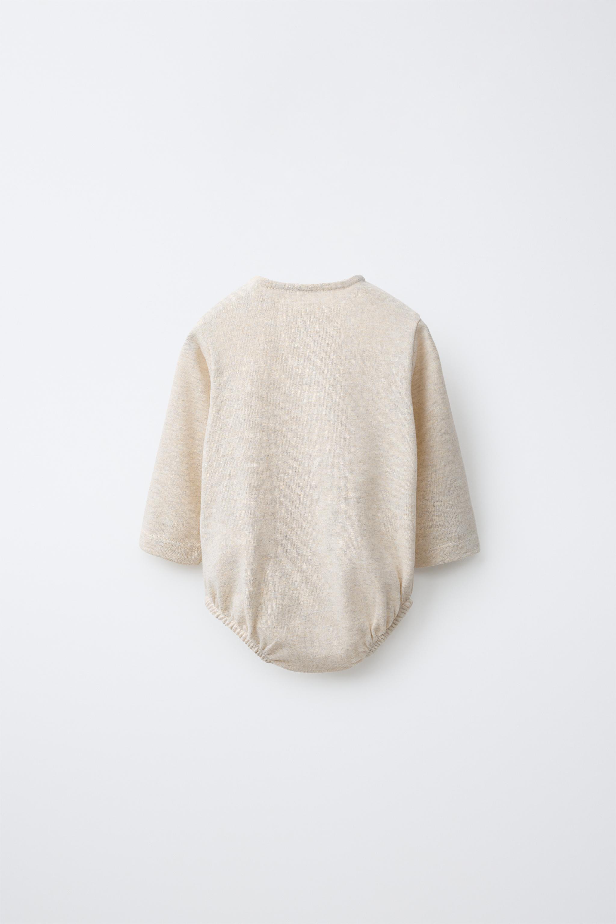 HENLEY NECK BODYSUIT — Mid-ecru