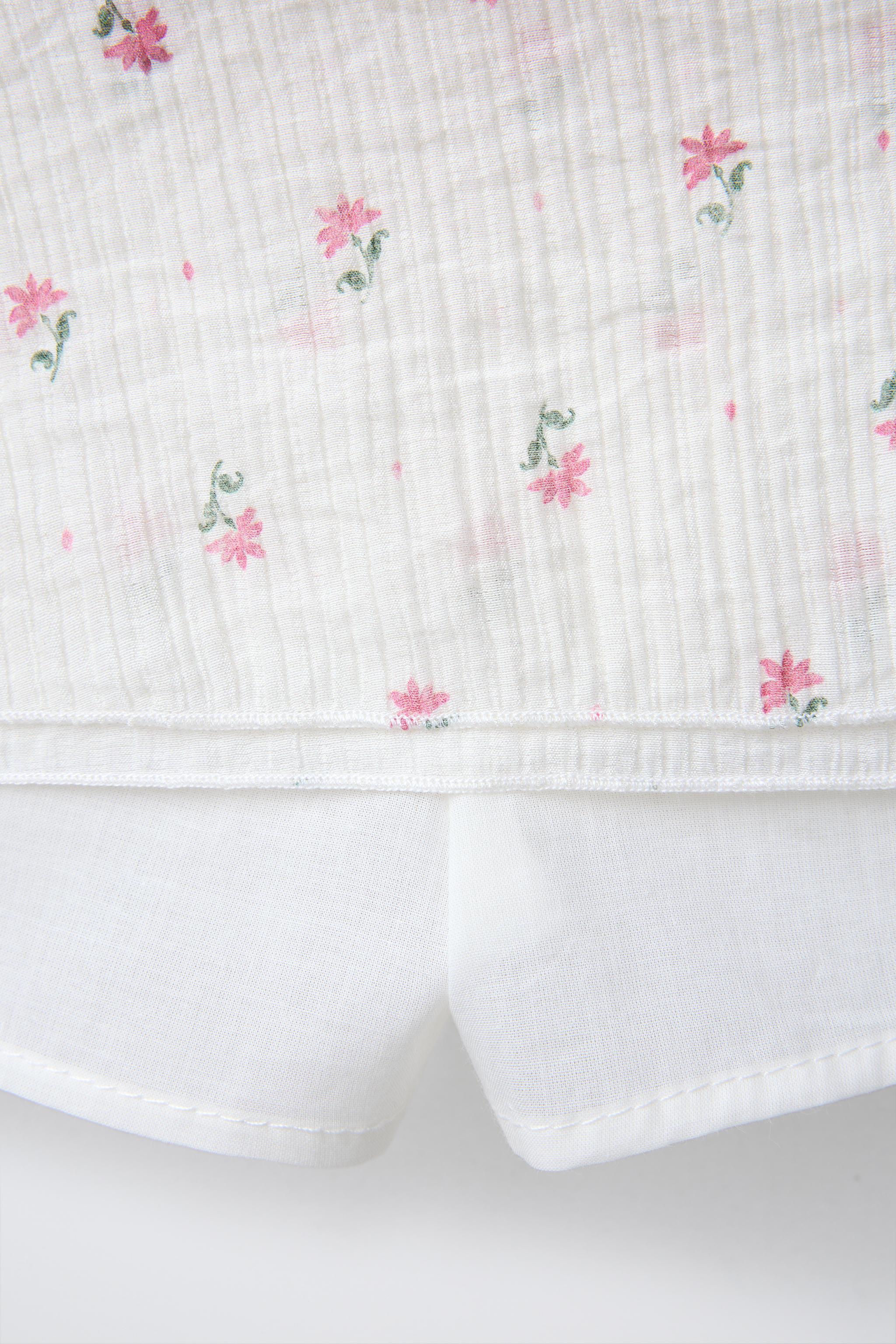 JUPE-SHORT À VOLANTS ET FLEURS