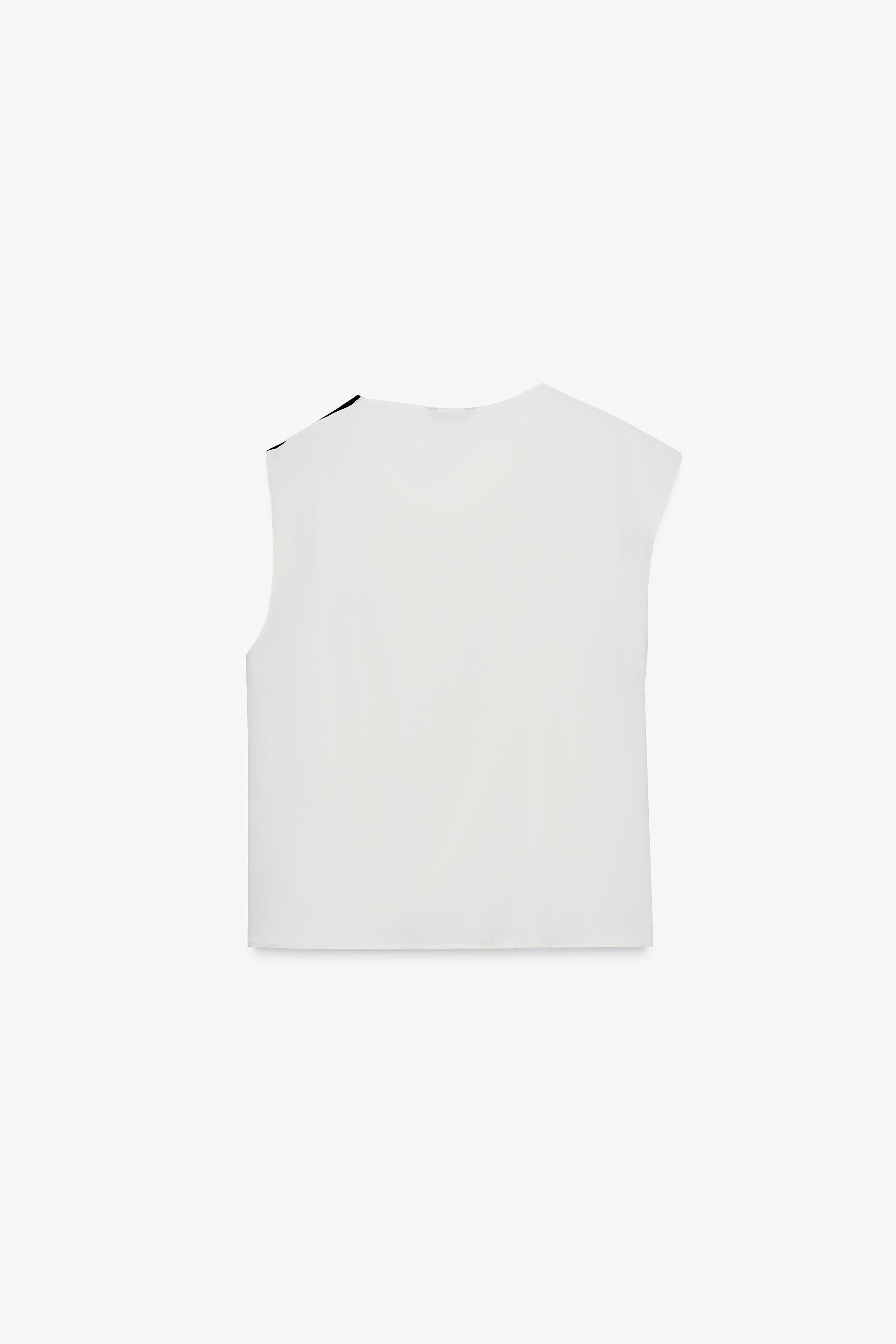 BLOUSE BOUTONS ÉPAULE