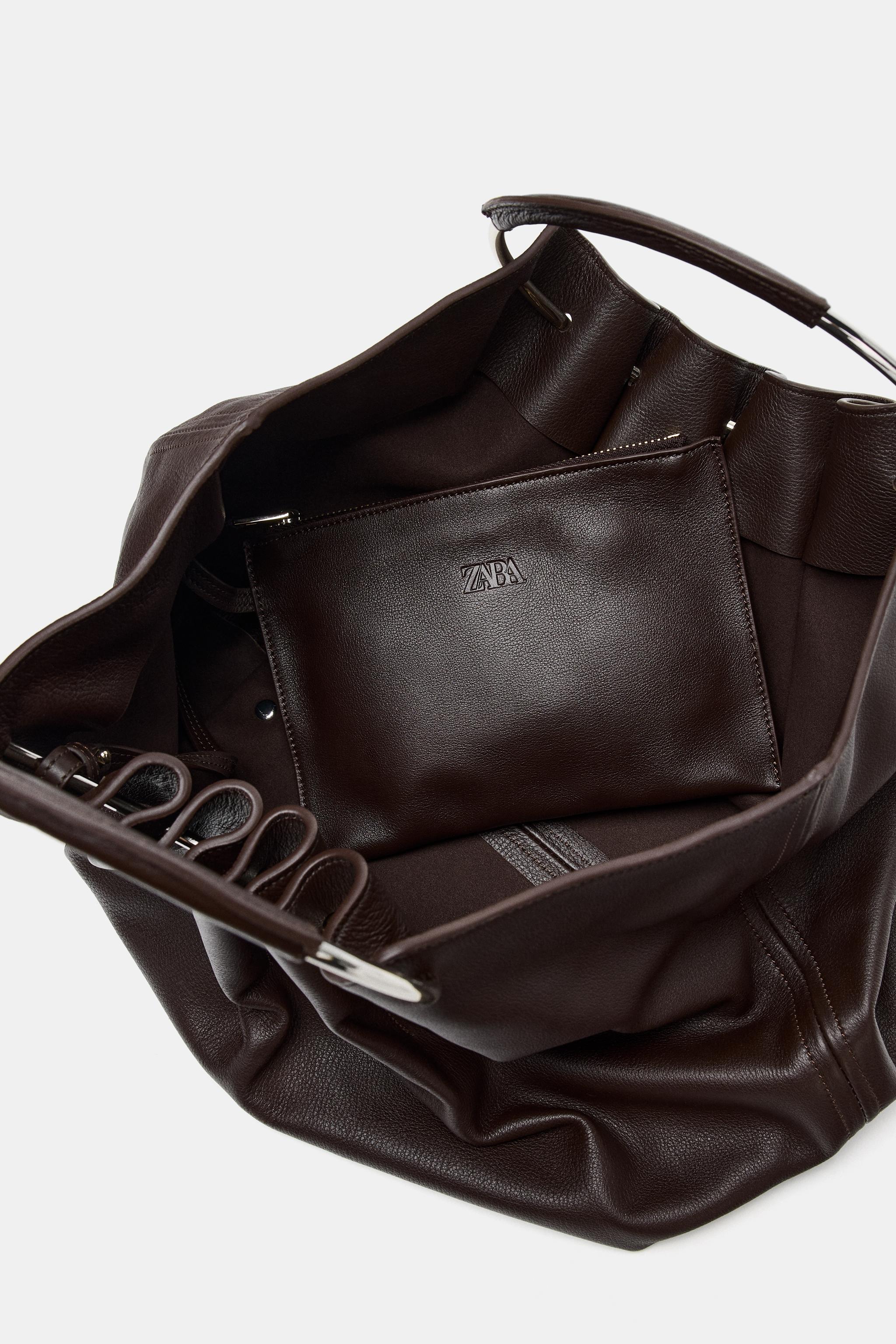 LEATHER BUCKET BAG WITH RIGID HANDLE