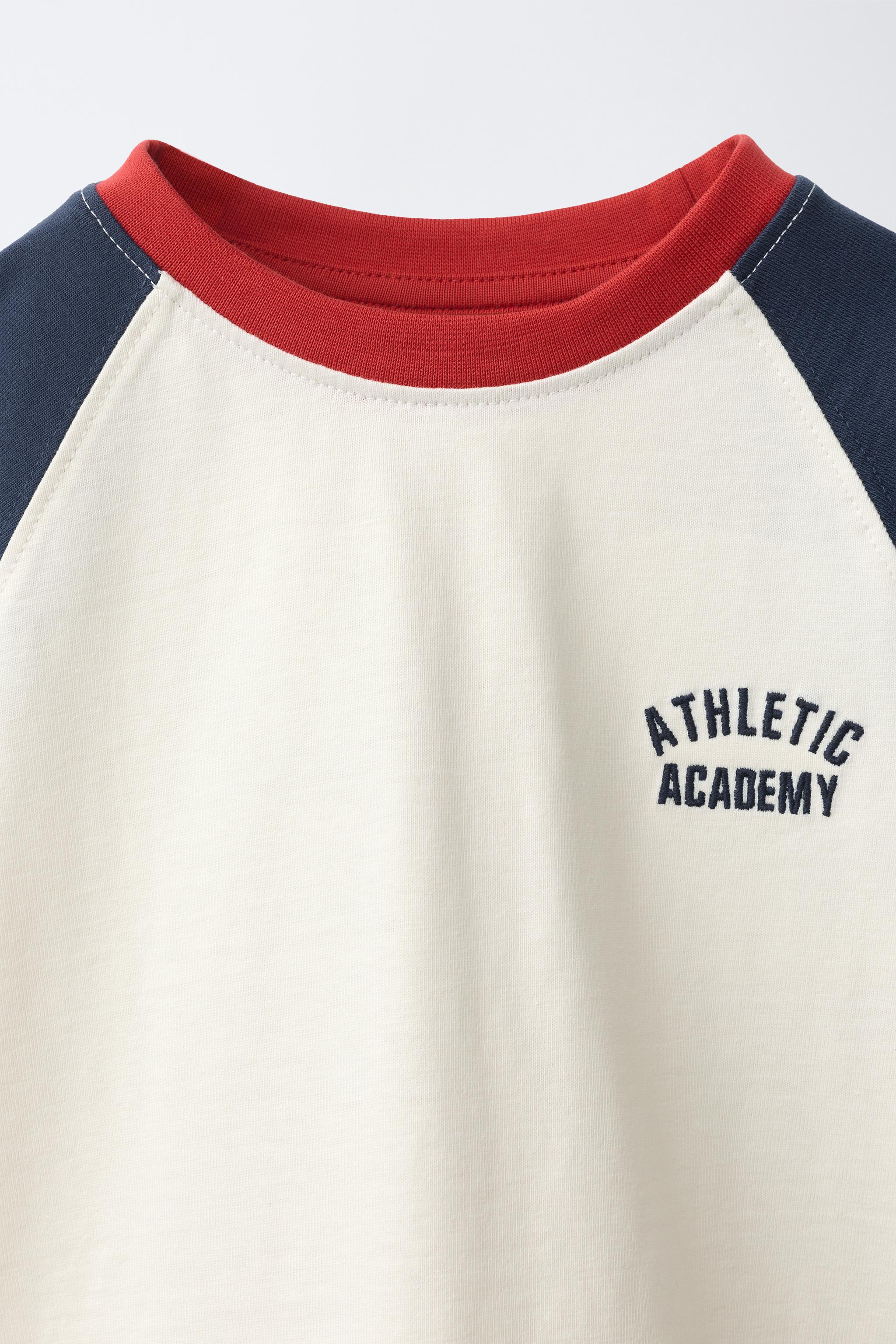 EMBROIDERED TEXT RAGLAN SLEEVE T-SHIRT