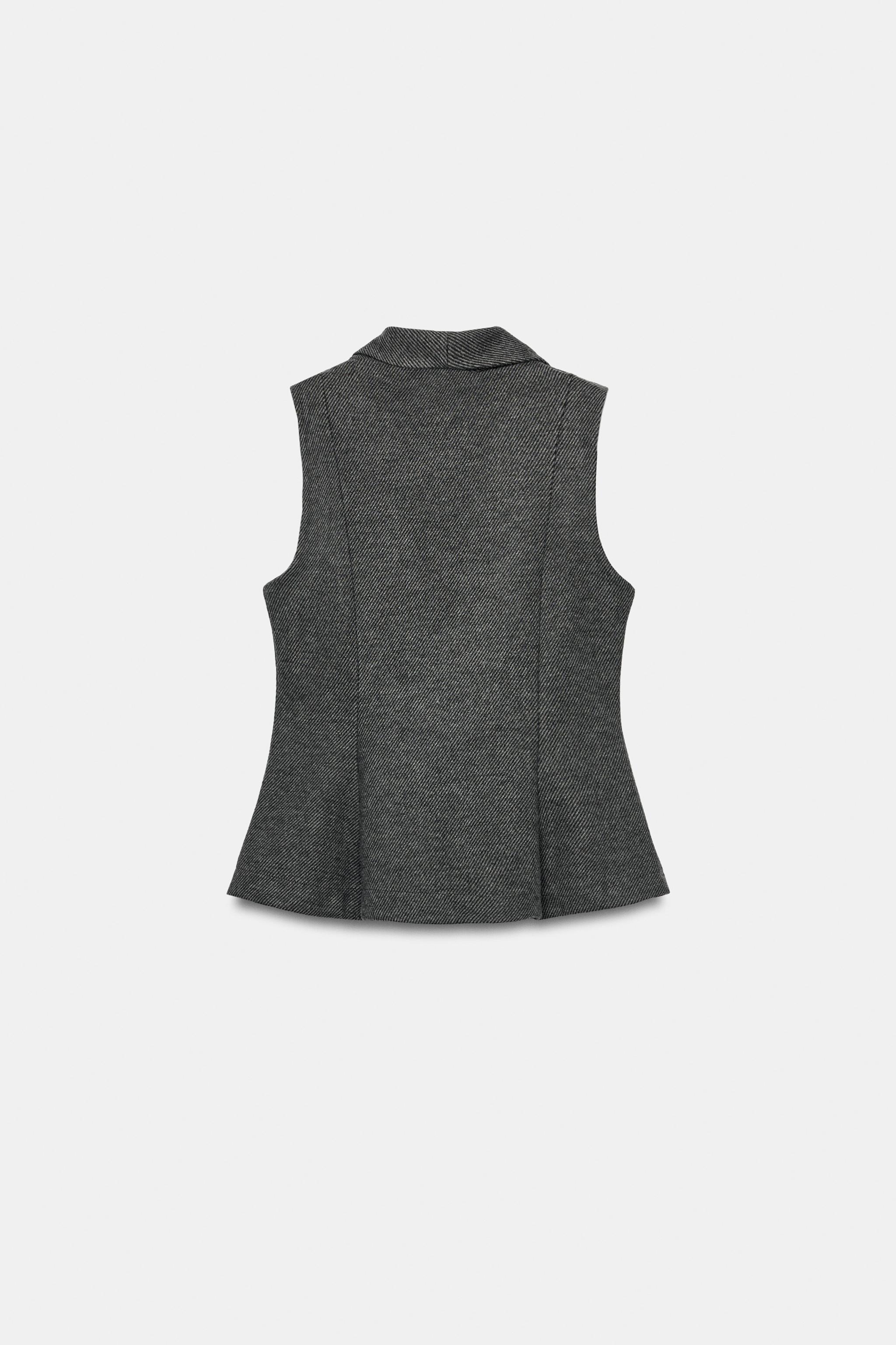 PEPLUM VEST