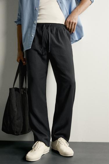 PANTALÓN RELAXED FIT 100% LYOCELL - Negro de Zara