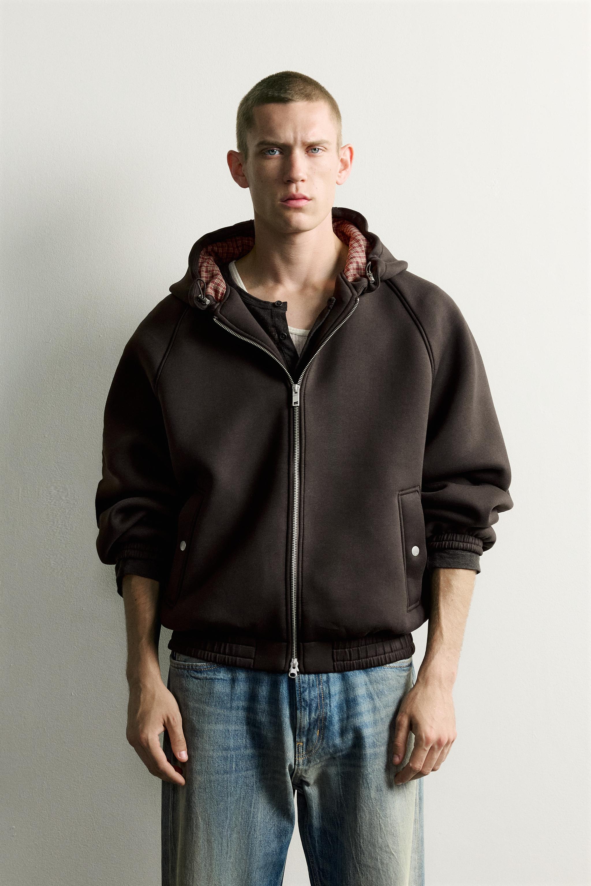 VESTE TECHNIQUE À CAPUCHE RELAXED FIT